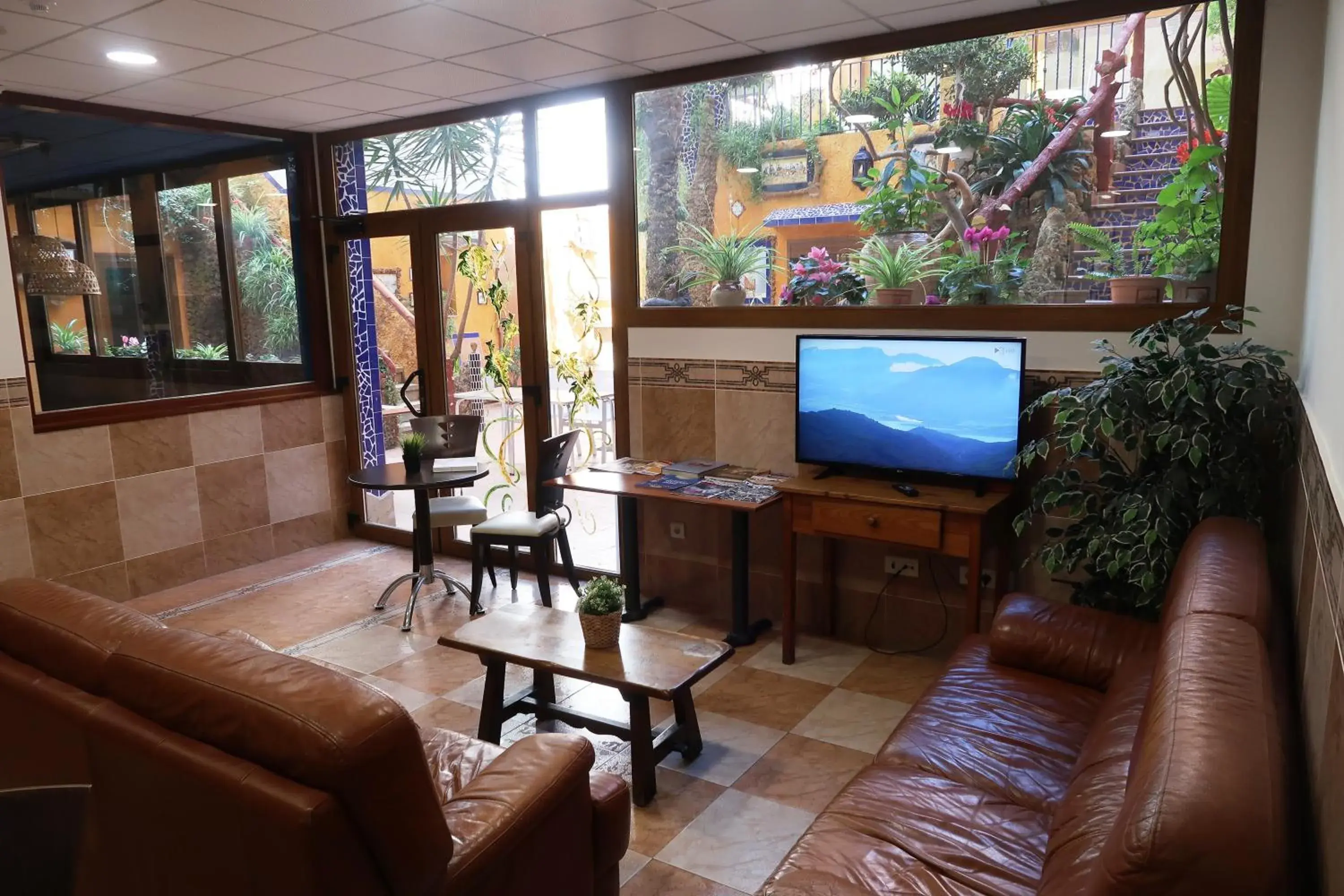 TV and multimedia in El Cami Hotel