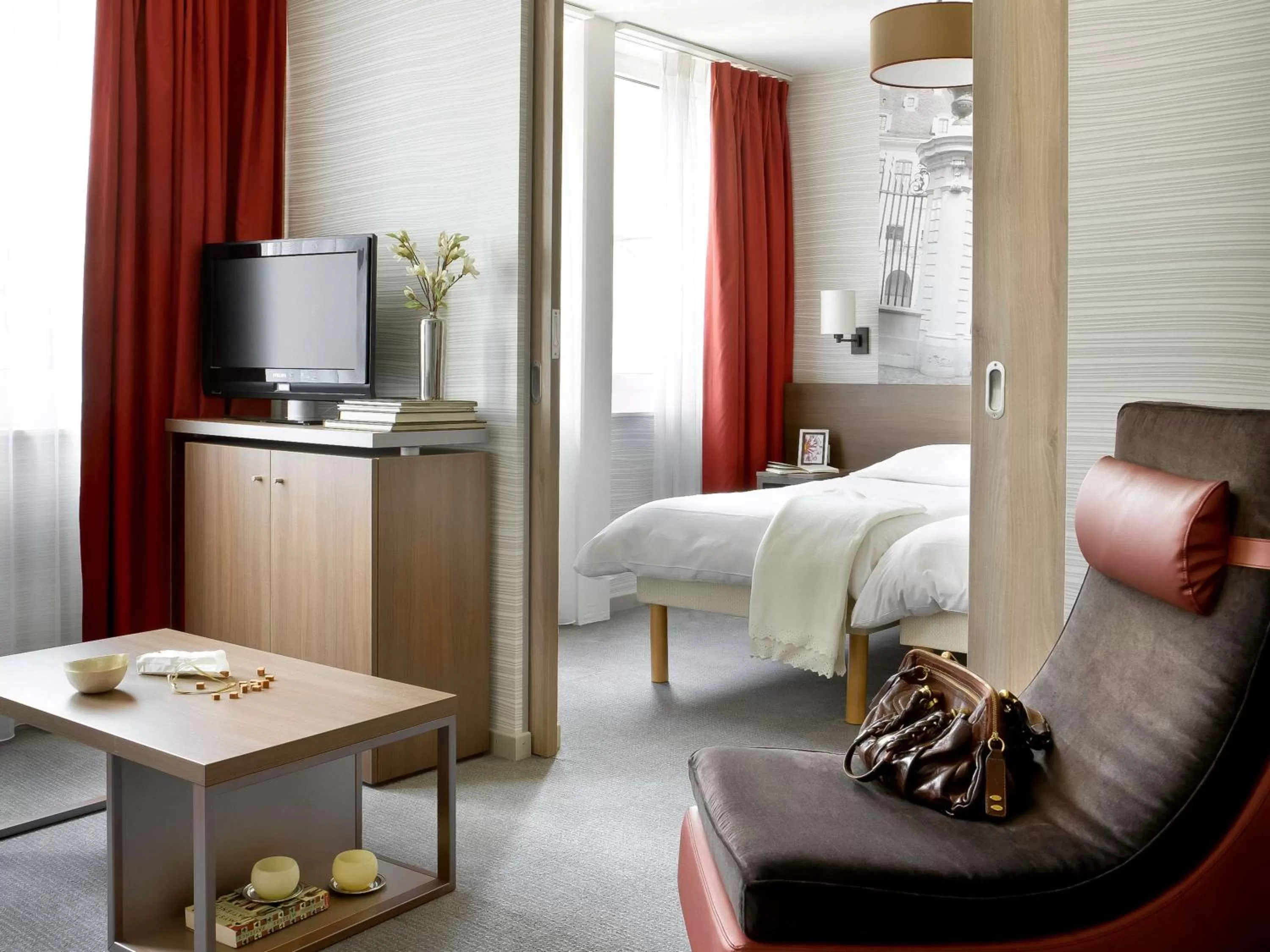 Photo of the whole room, Bed in Aparthotel Adagio Basel City