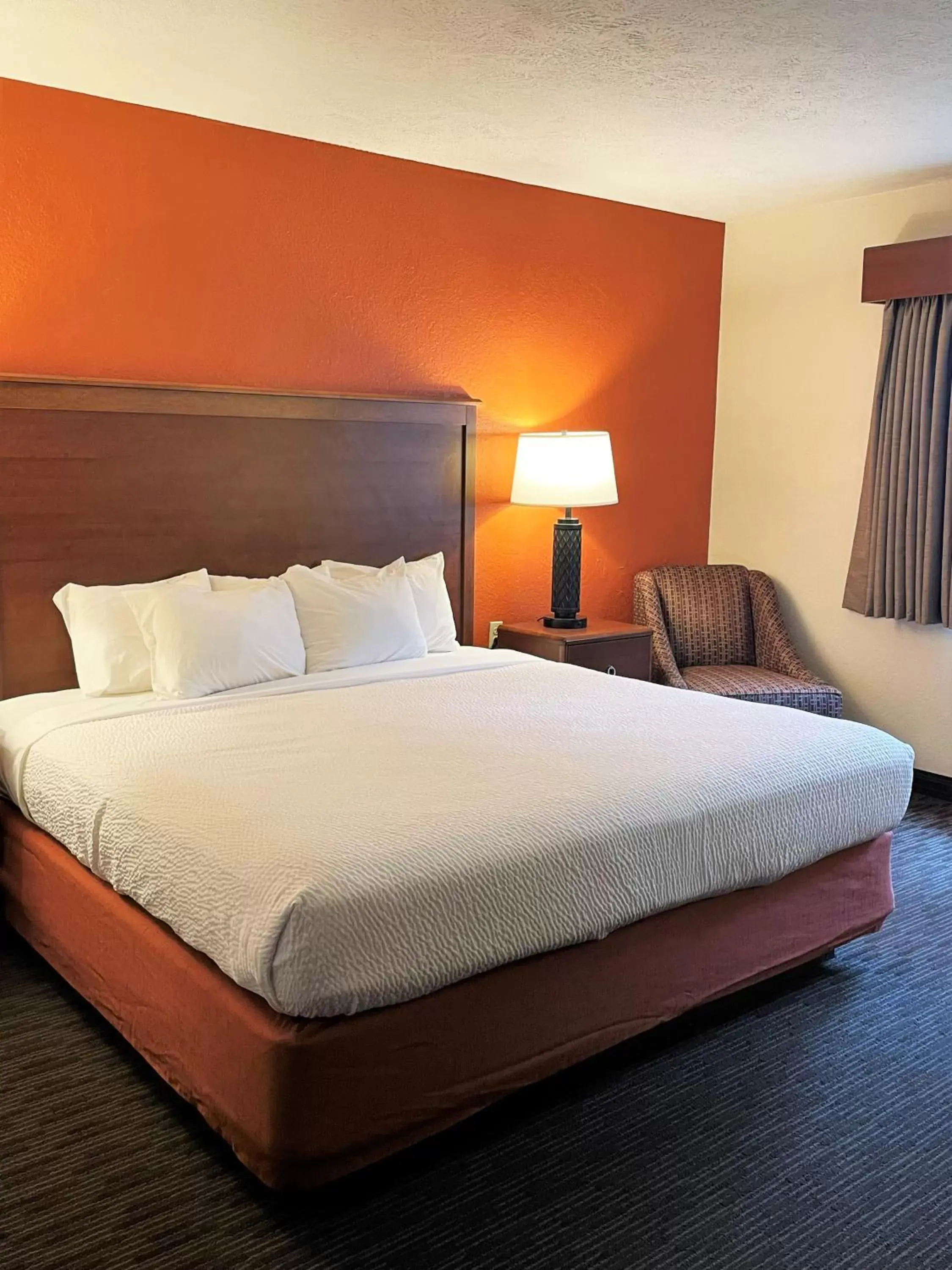 Bed in AmericInn by Wyndham Petoskey