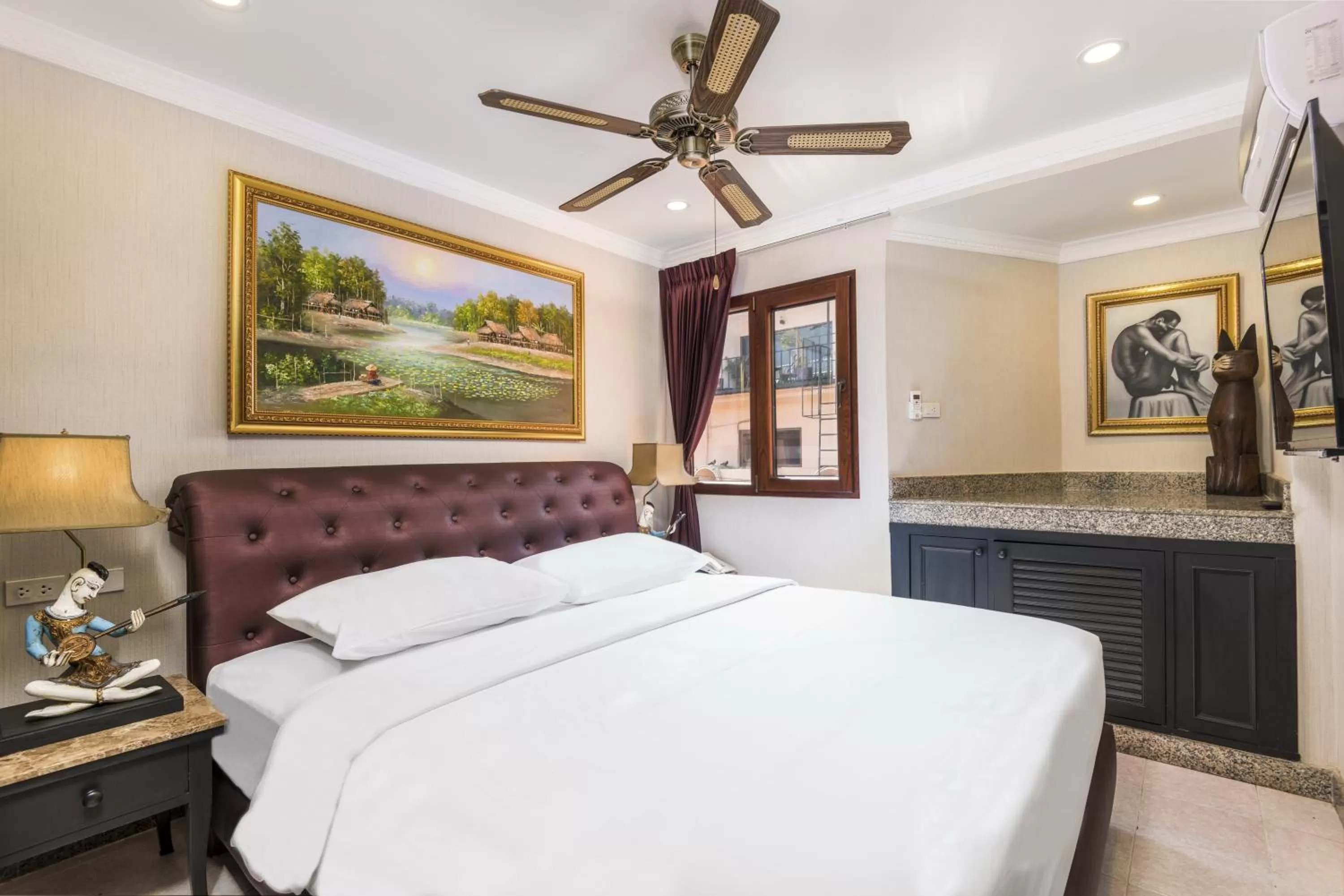 Bed in The Ambiance Hotel