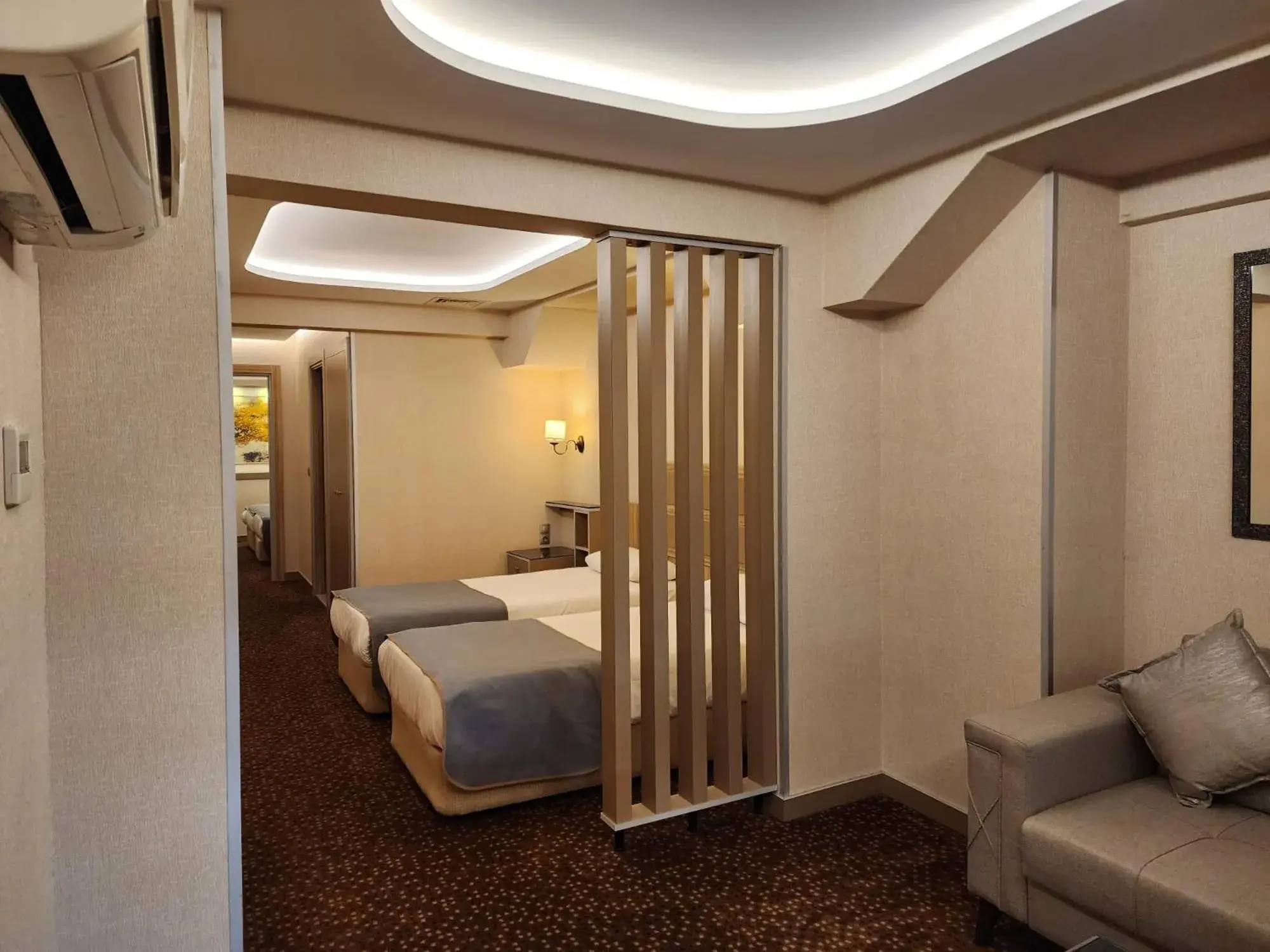 Bed in Nanda Hotel