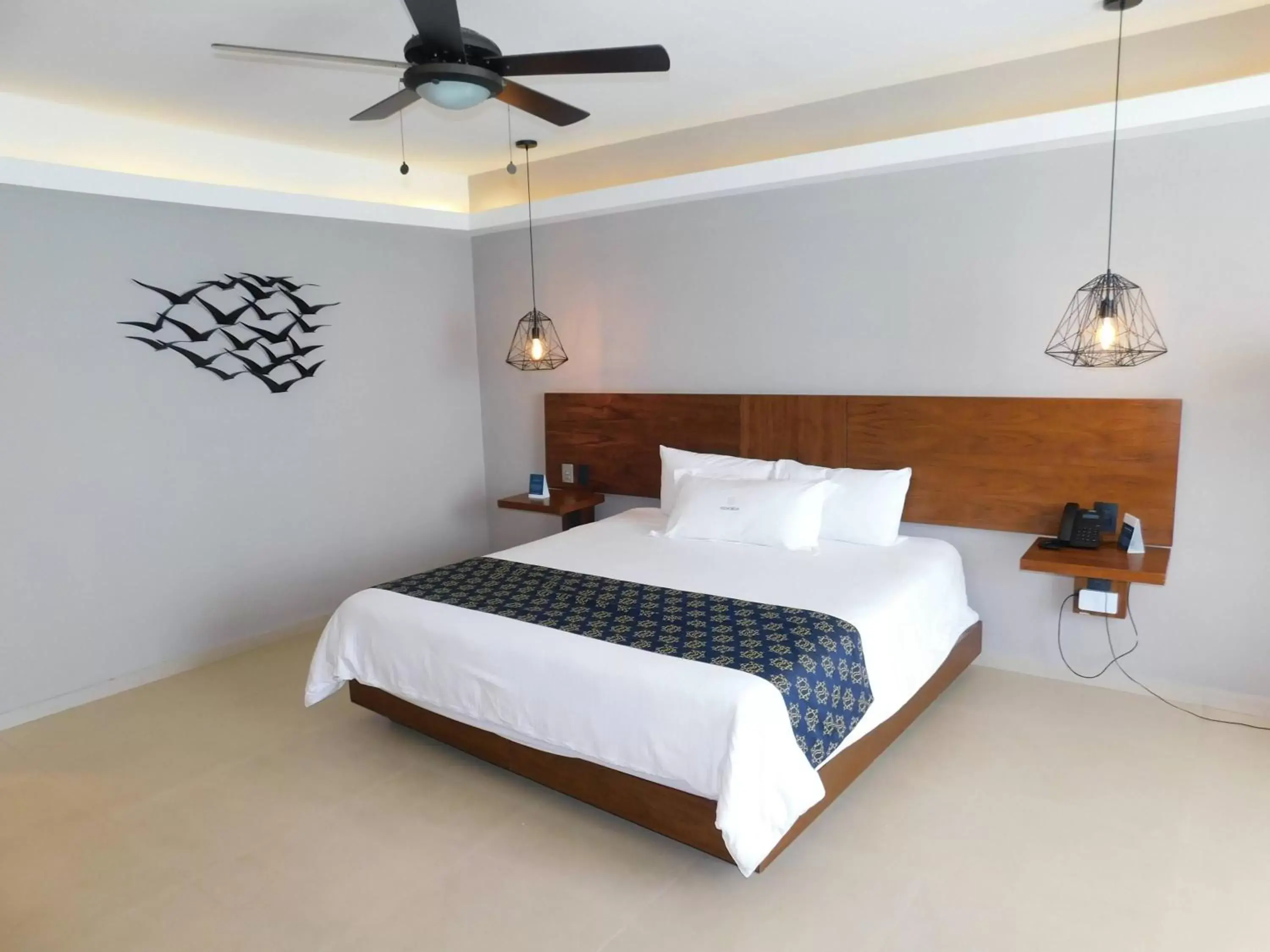 Bed in Ocean Dream Cancun by GuruHotel