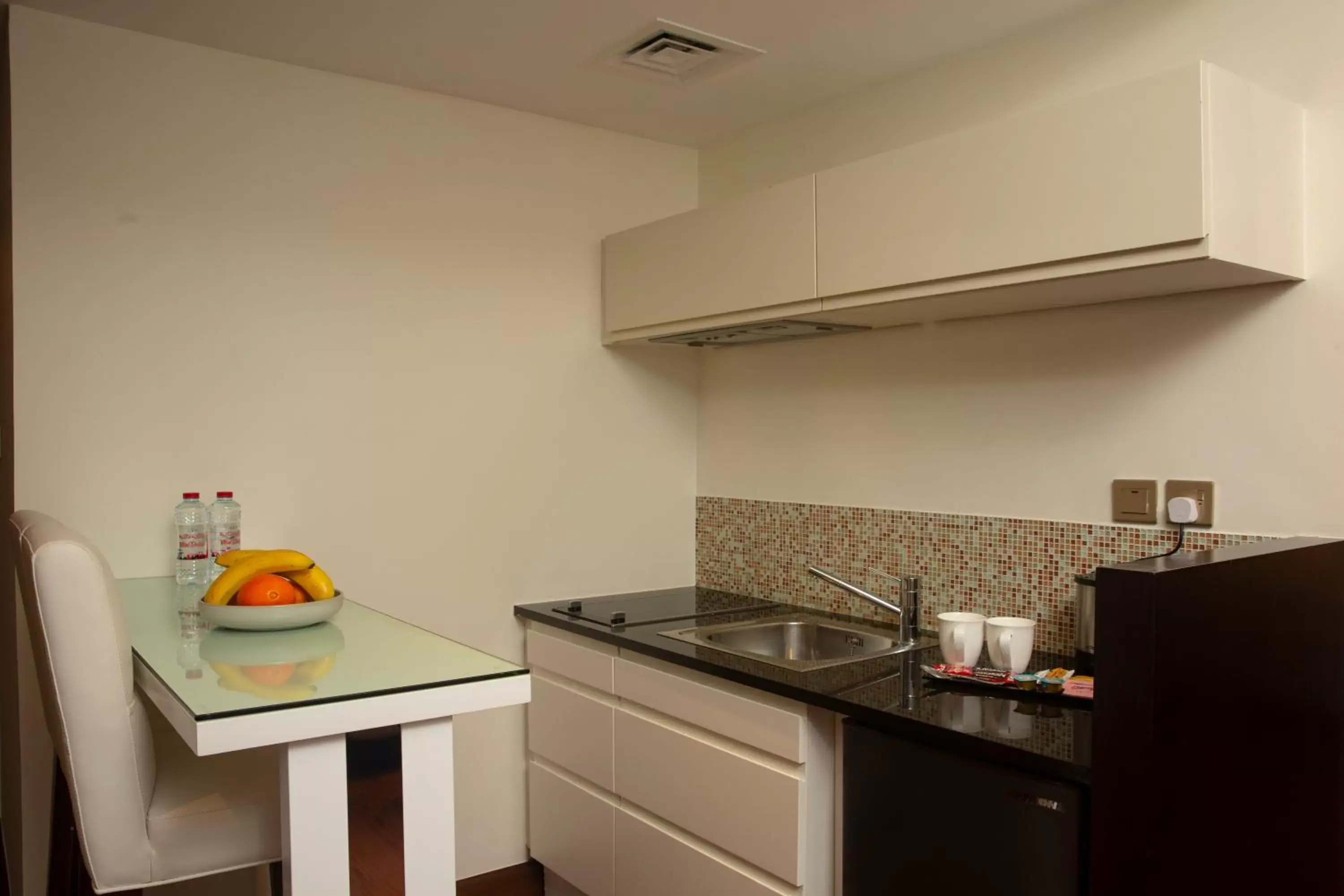Kitchen or kitchenette, Kitchen/Kitchenette in Number One Tower Suites Hotel