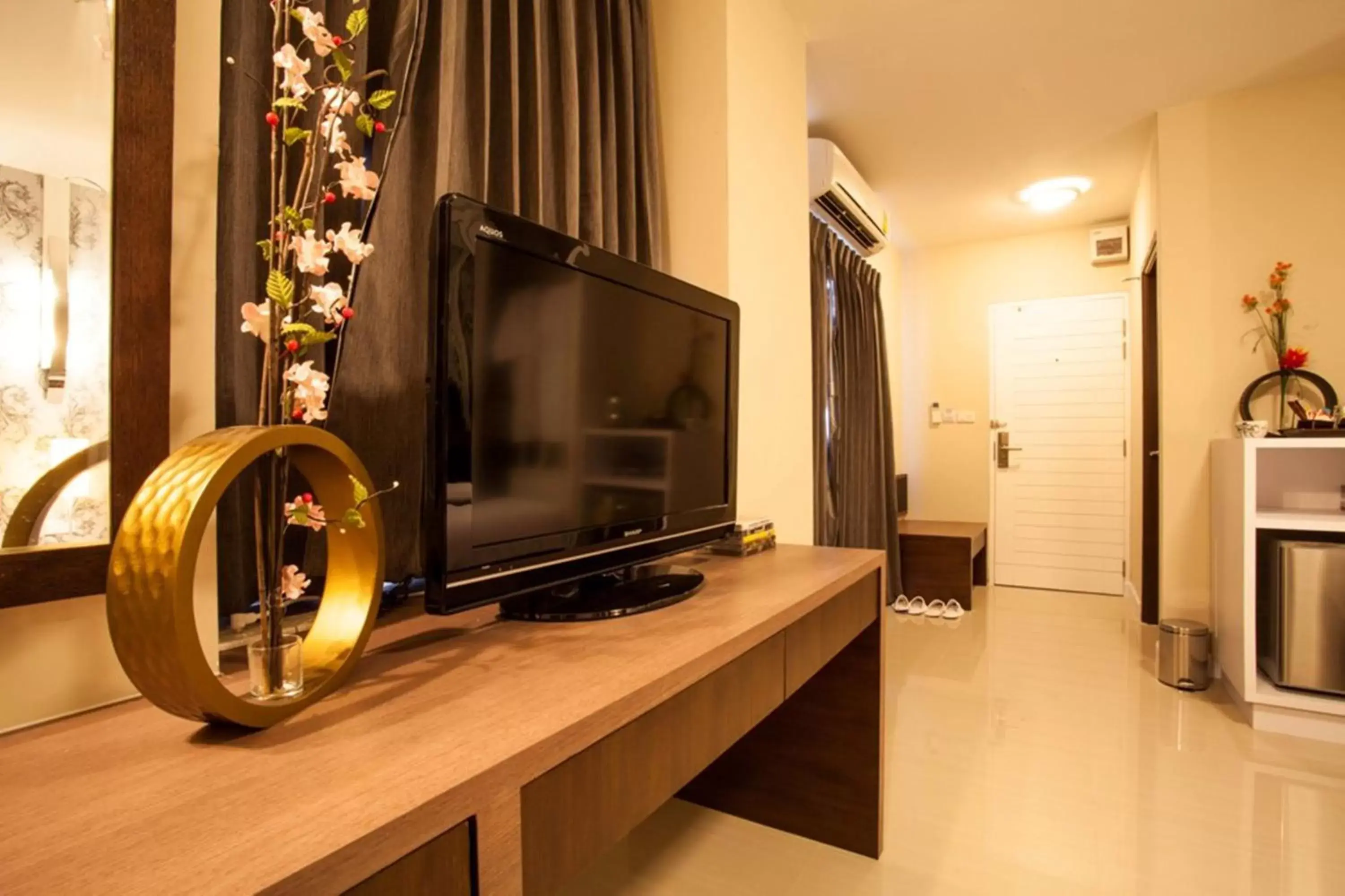 TV and multimedia, TV/Entertainment Center in The Aim Sathorn Hotel