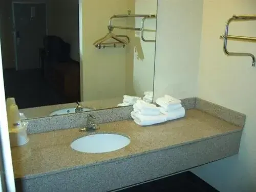 Bathroom in Travelers Inn & Suites