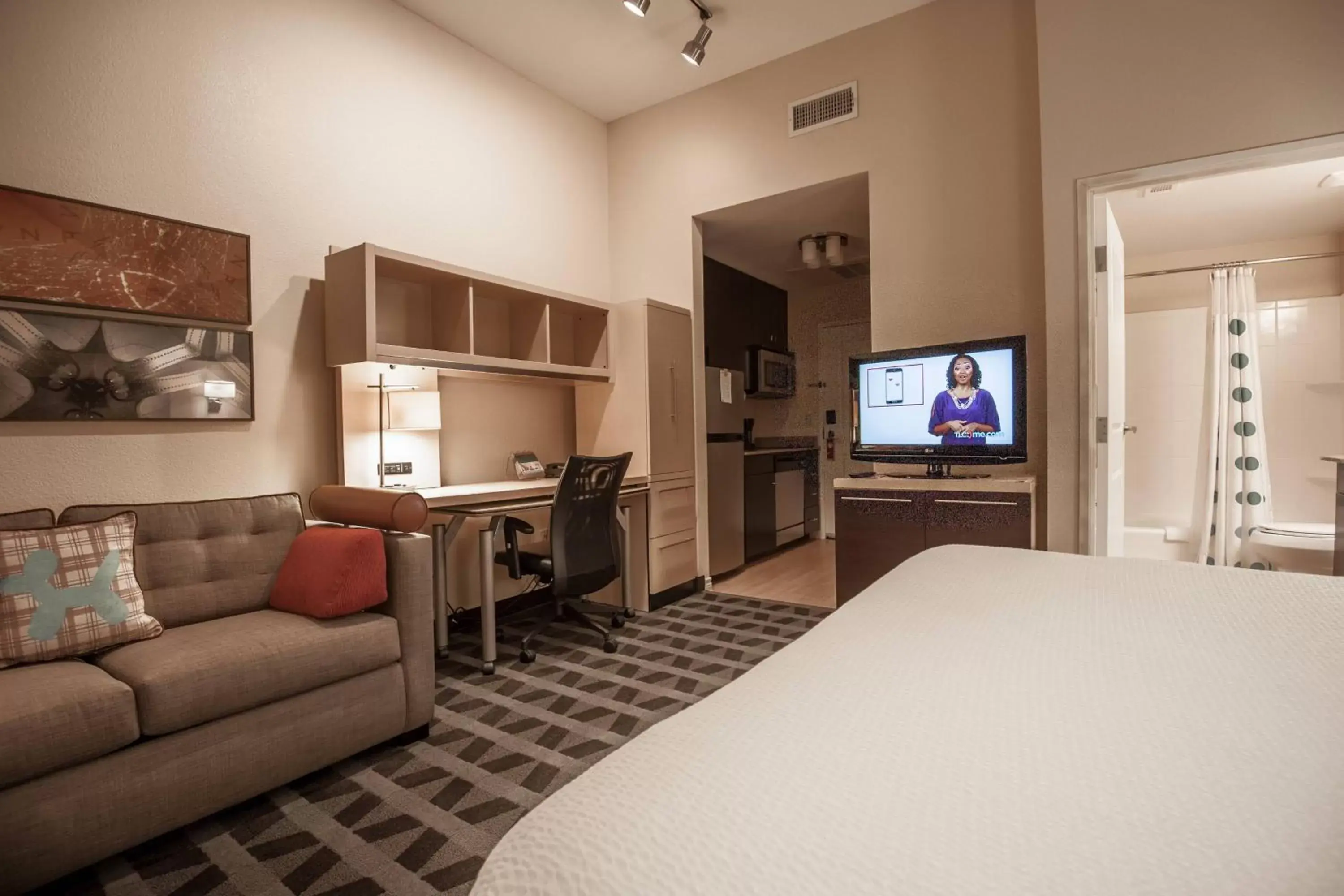 Photo of the whole room, TV/Entertainment Center in TownePlace Suites Dallas DeSoto