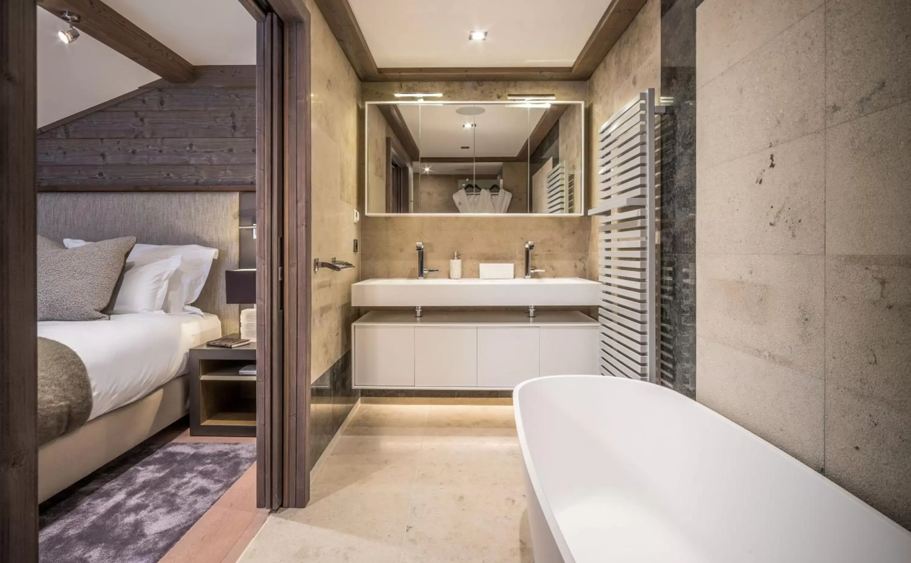 Bed, Bathroom in Six Senses Residences & Spa Courchevel