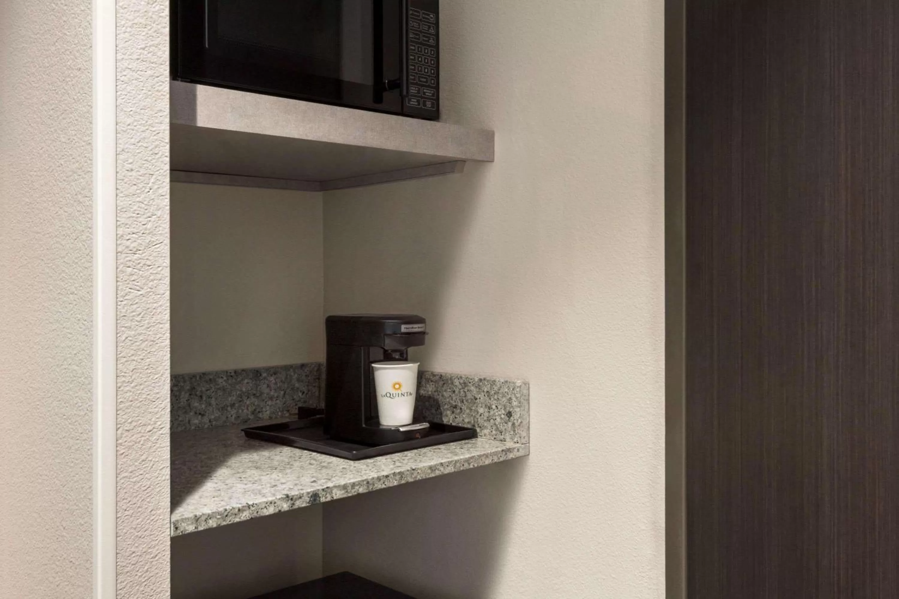 Photo of the whole room in La Quinta Inn & Suites by Wyndham Orlando I-Drive Theme Parks