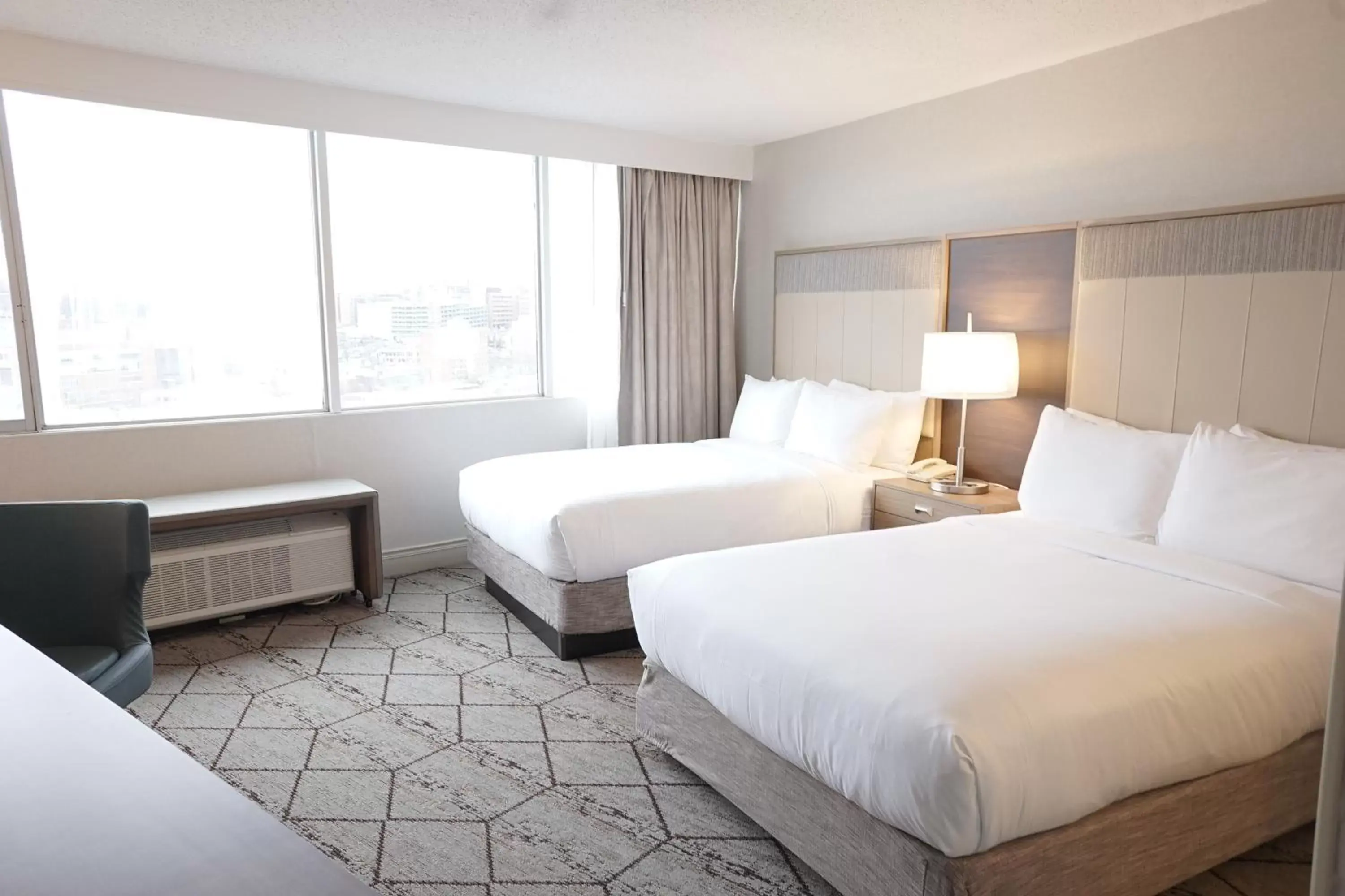 Photo of the whole room, Bed in Crowne Plaza Syracuse, an IHG Hotel