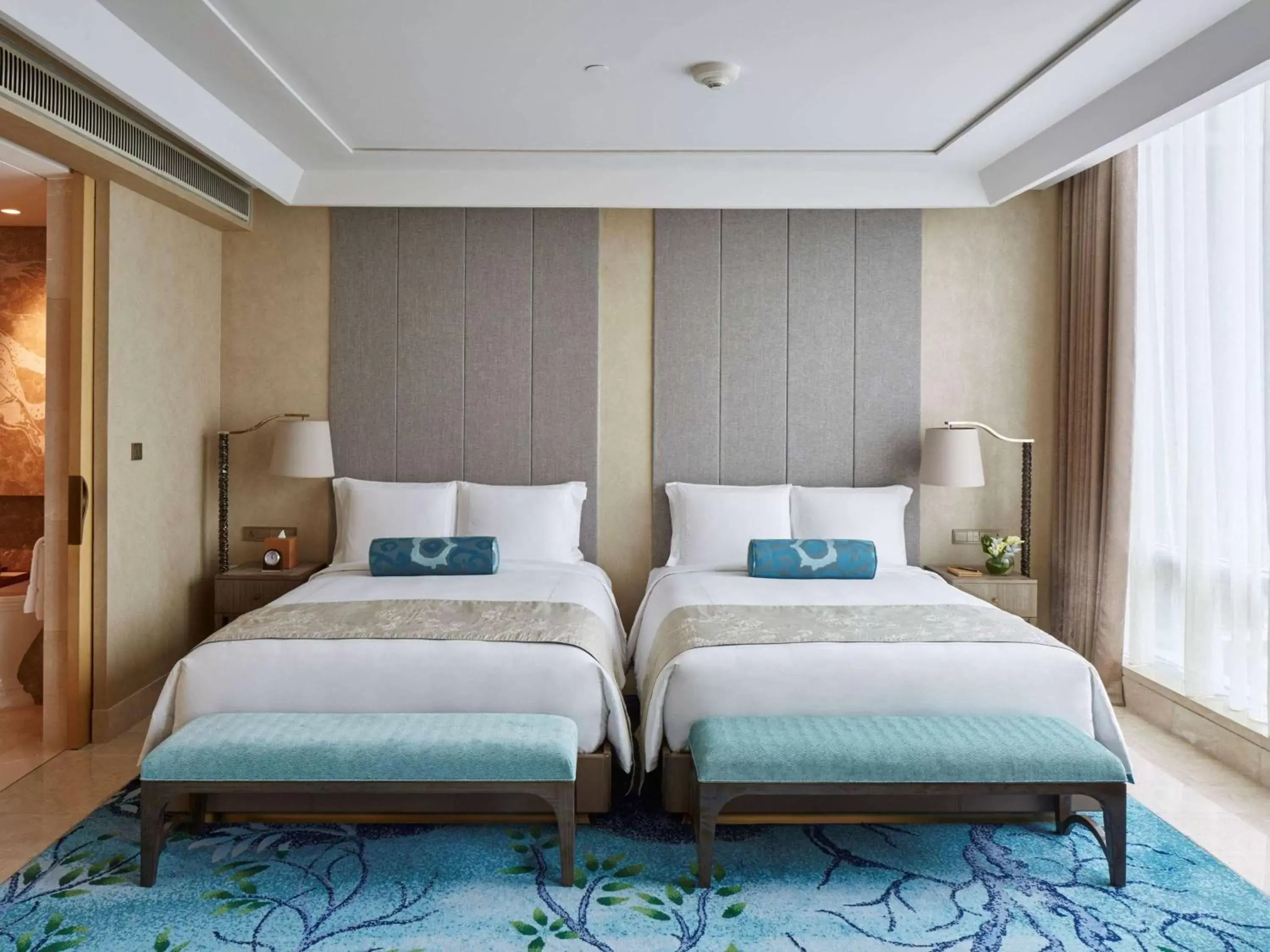 Photo of the whole room, Bed in Raffles Jakarta