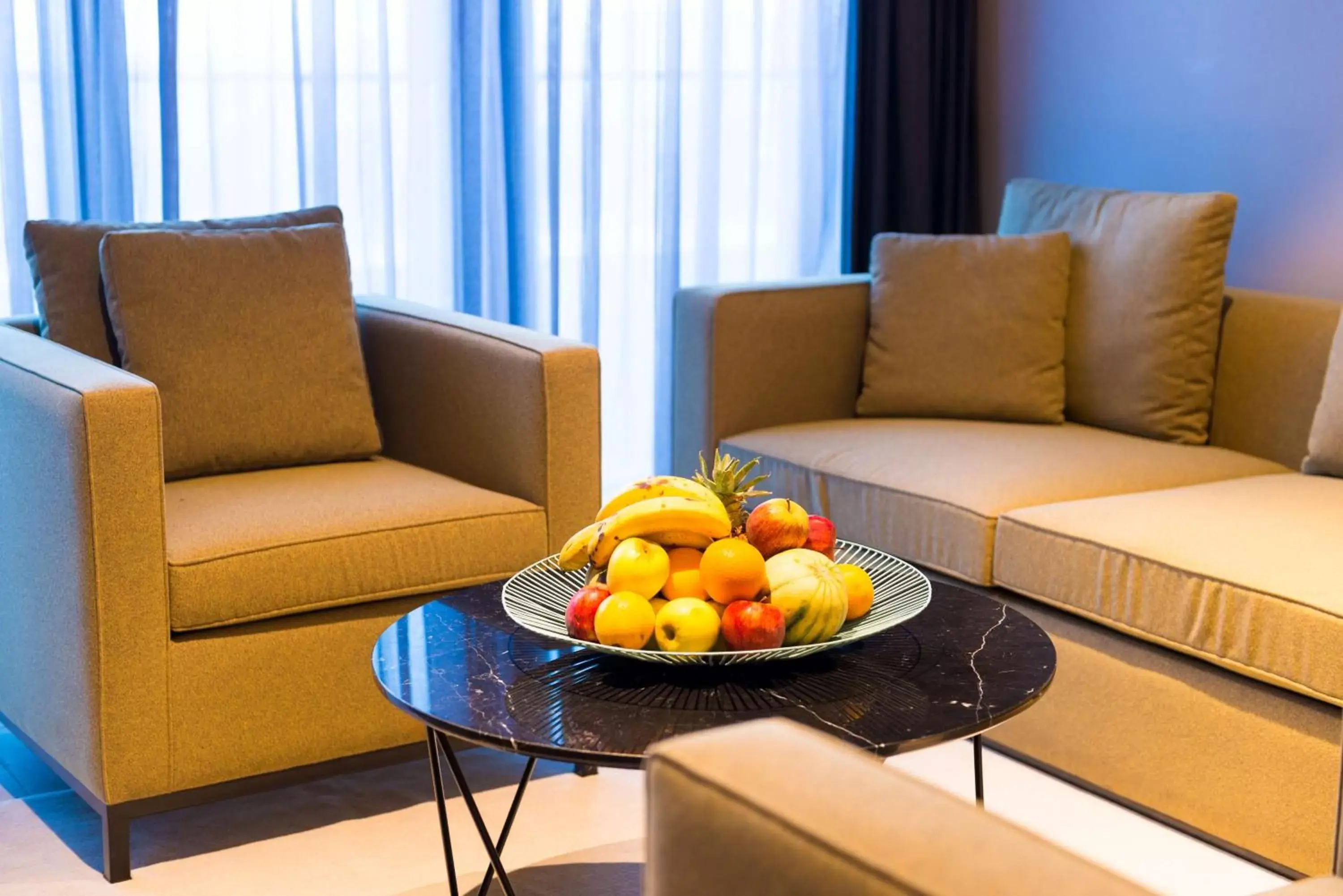 Photo of the whole room, Seating Area in Radisson Hotel Dakar Diamniadio