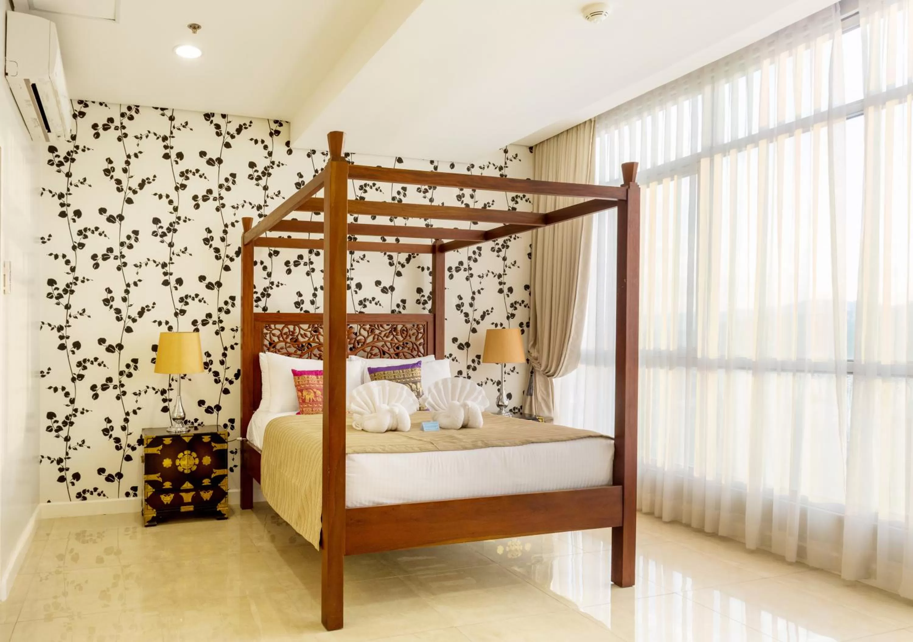 Bed in Alicia Apartelle