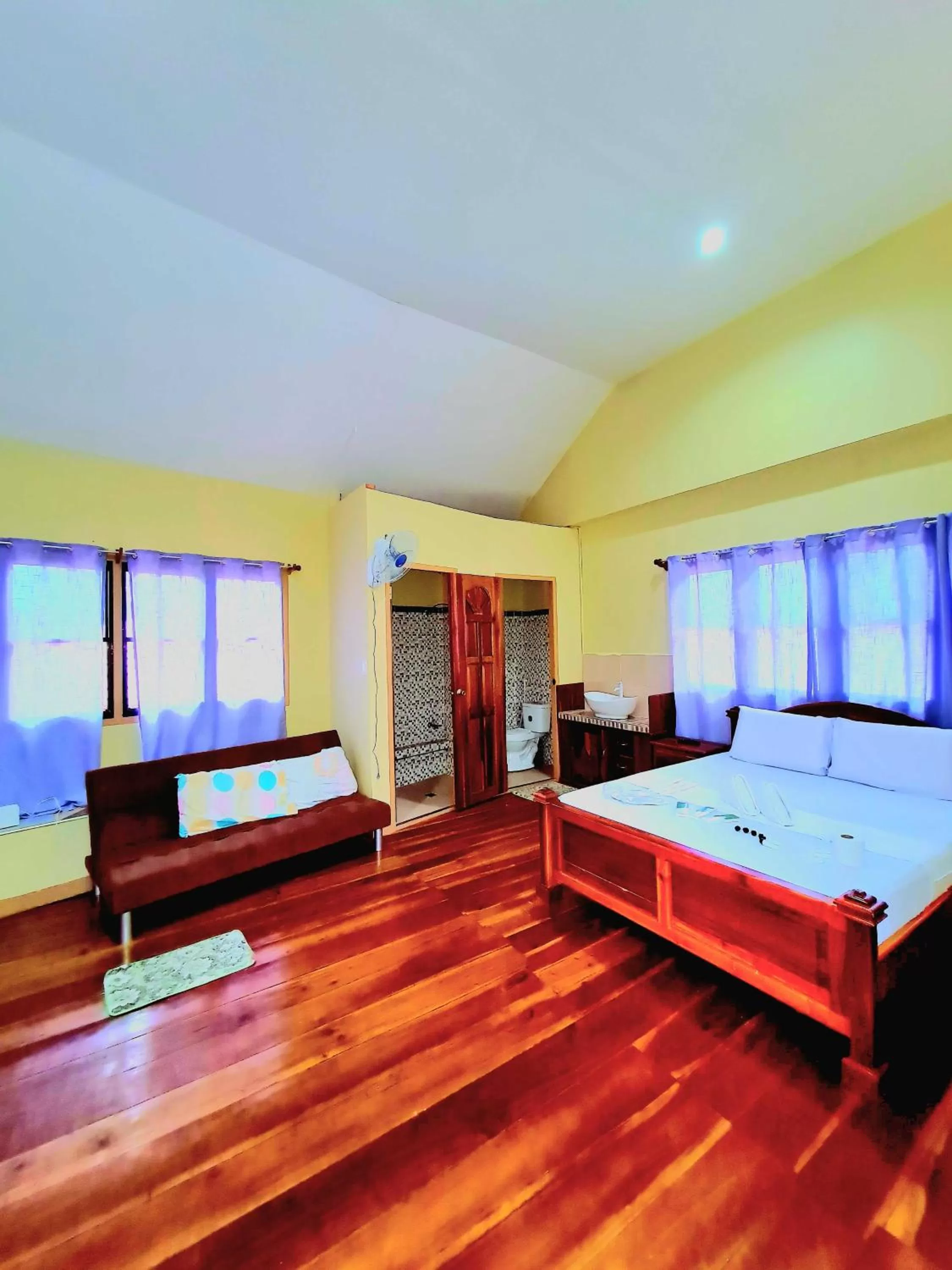 Bed in La-Familia Guest House