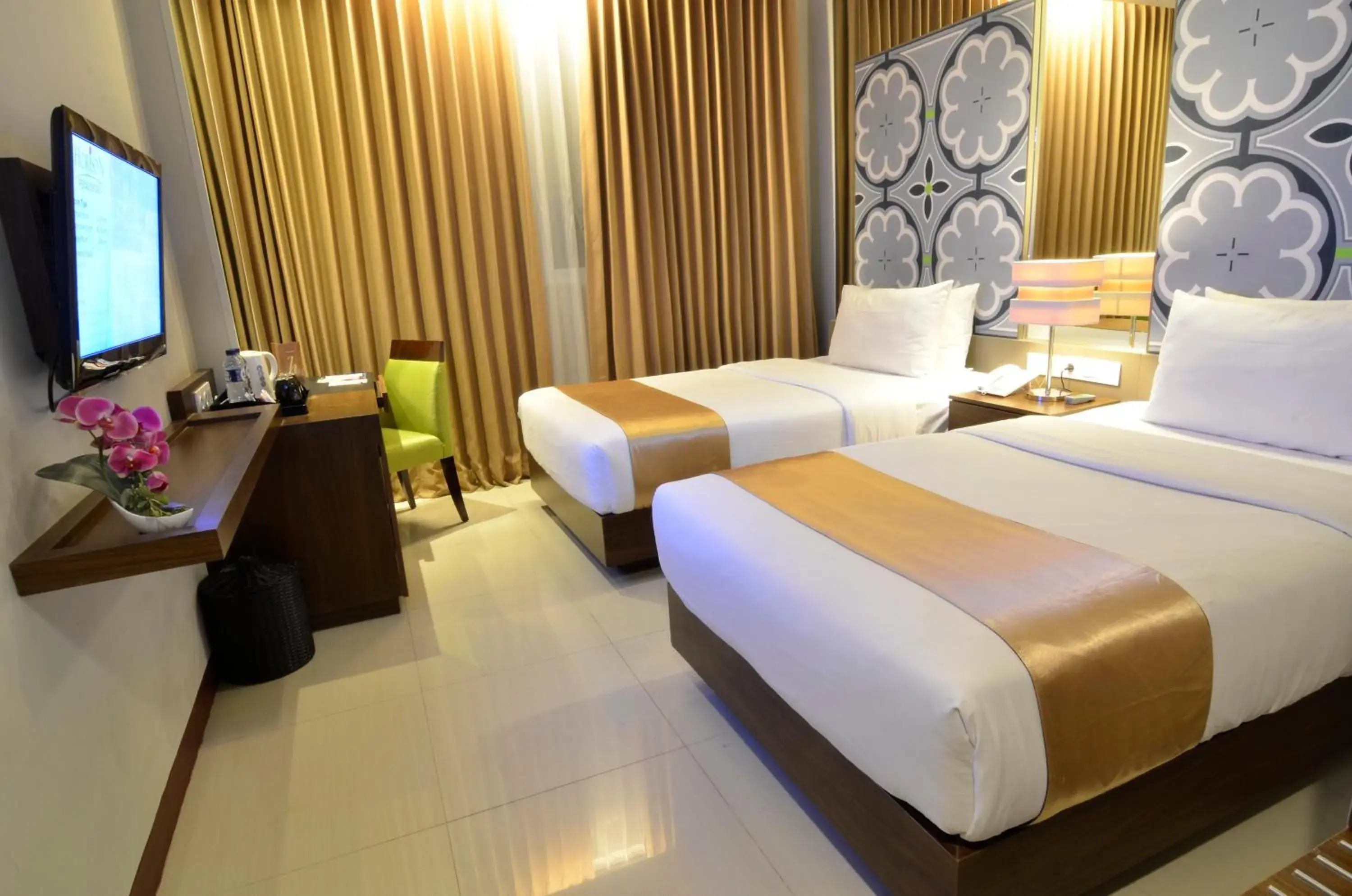 Bed in Howard Johnson By Wyndham Pekalongan