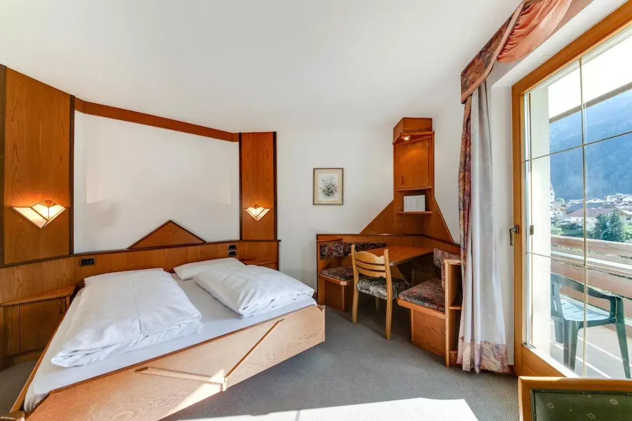Bed in Smy Koflerhof Wellness & Spa Dolomiti