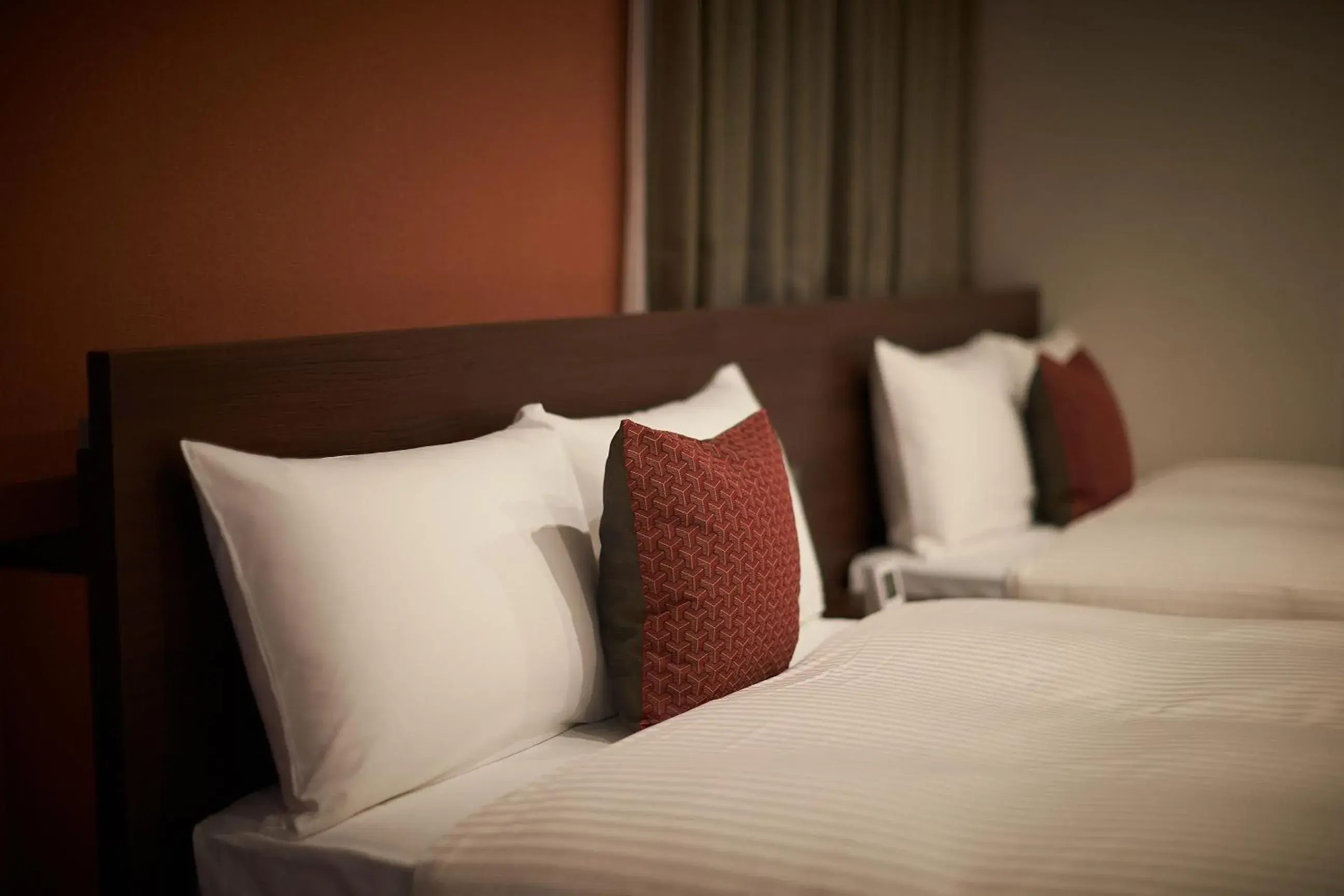 Bed in Y's Inn Naha Oroku Ekimae Bed in Y's Inn Naha Oroku Ekimae