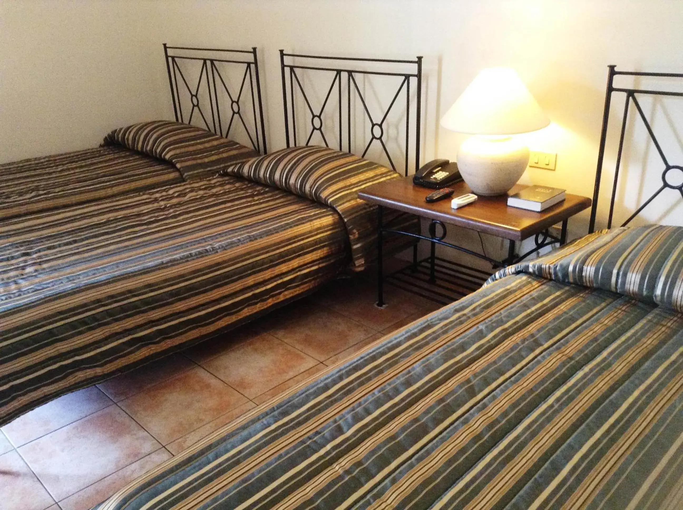 Bed in Citystate Asturias Hotel