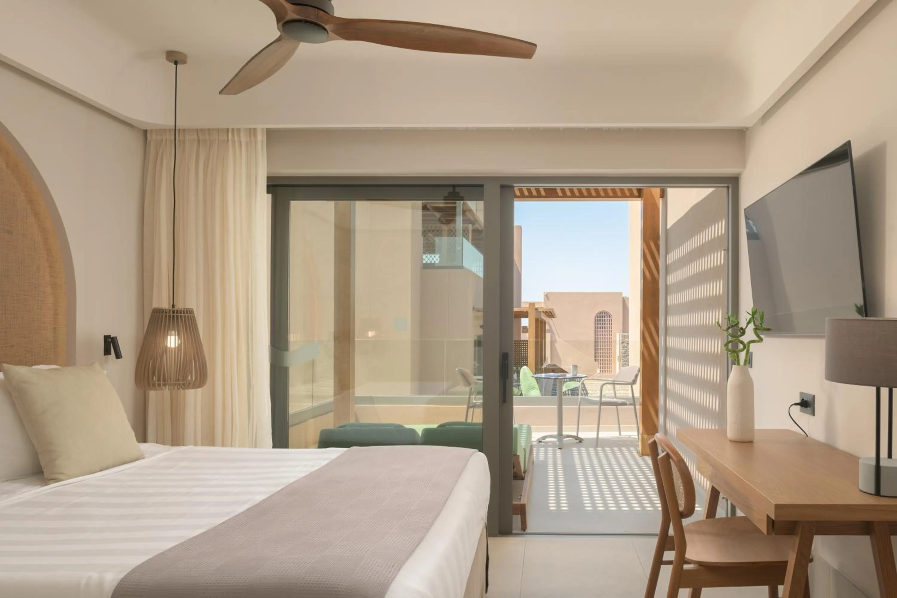 Bed in Paralos Venus Suites Adults Only