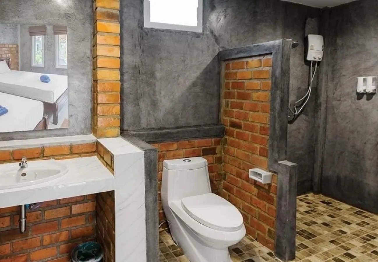 Bathroom in Lanta New Beach Bungalows - SHA Plus