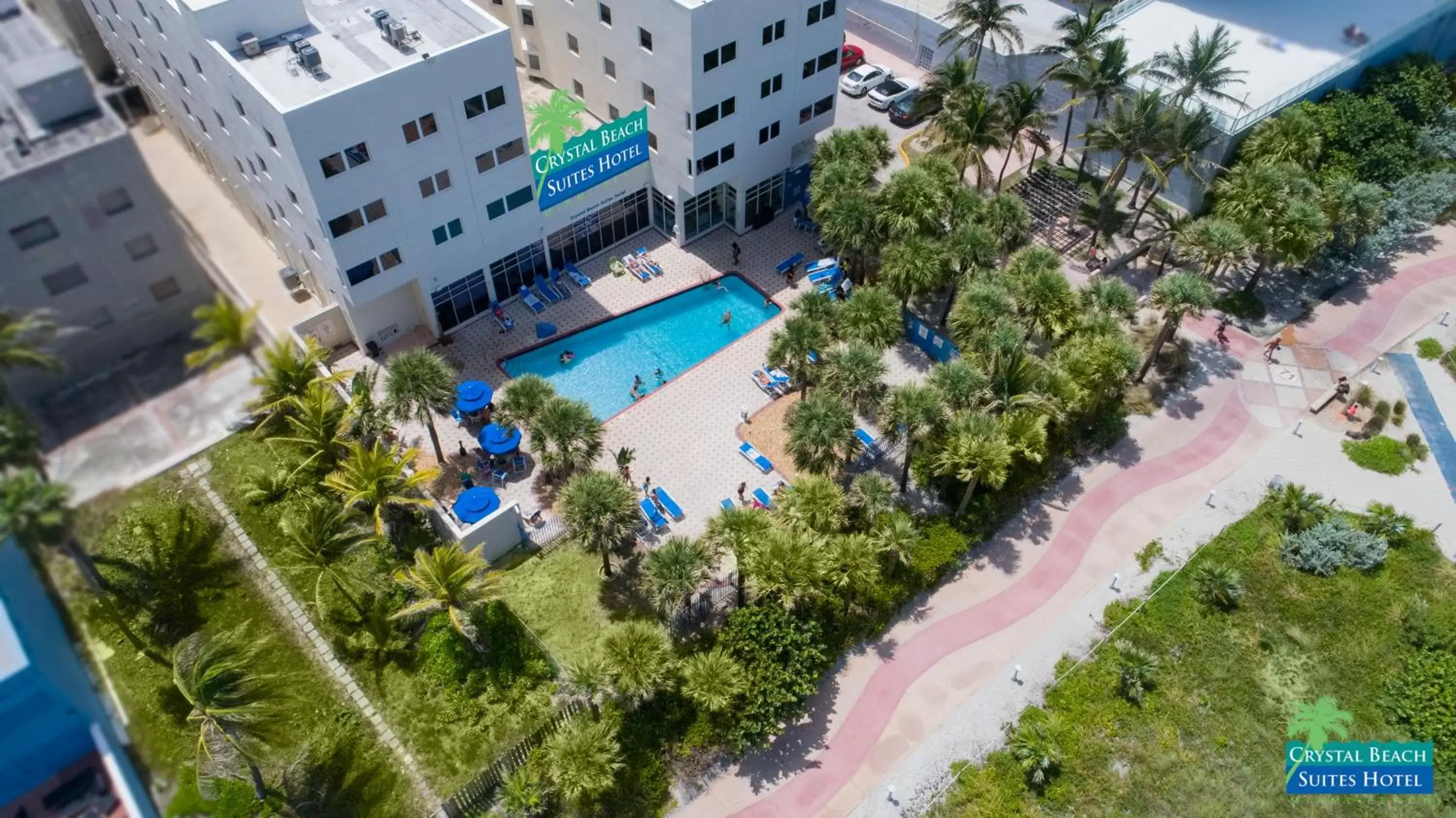 Swimming pool, Bird's-eye View in Crystal Beach Suites Oceanfront Hotel