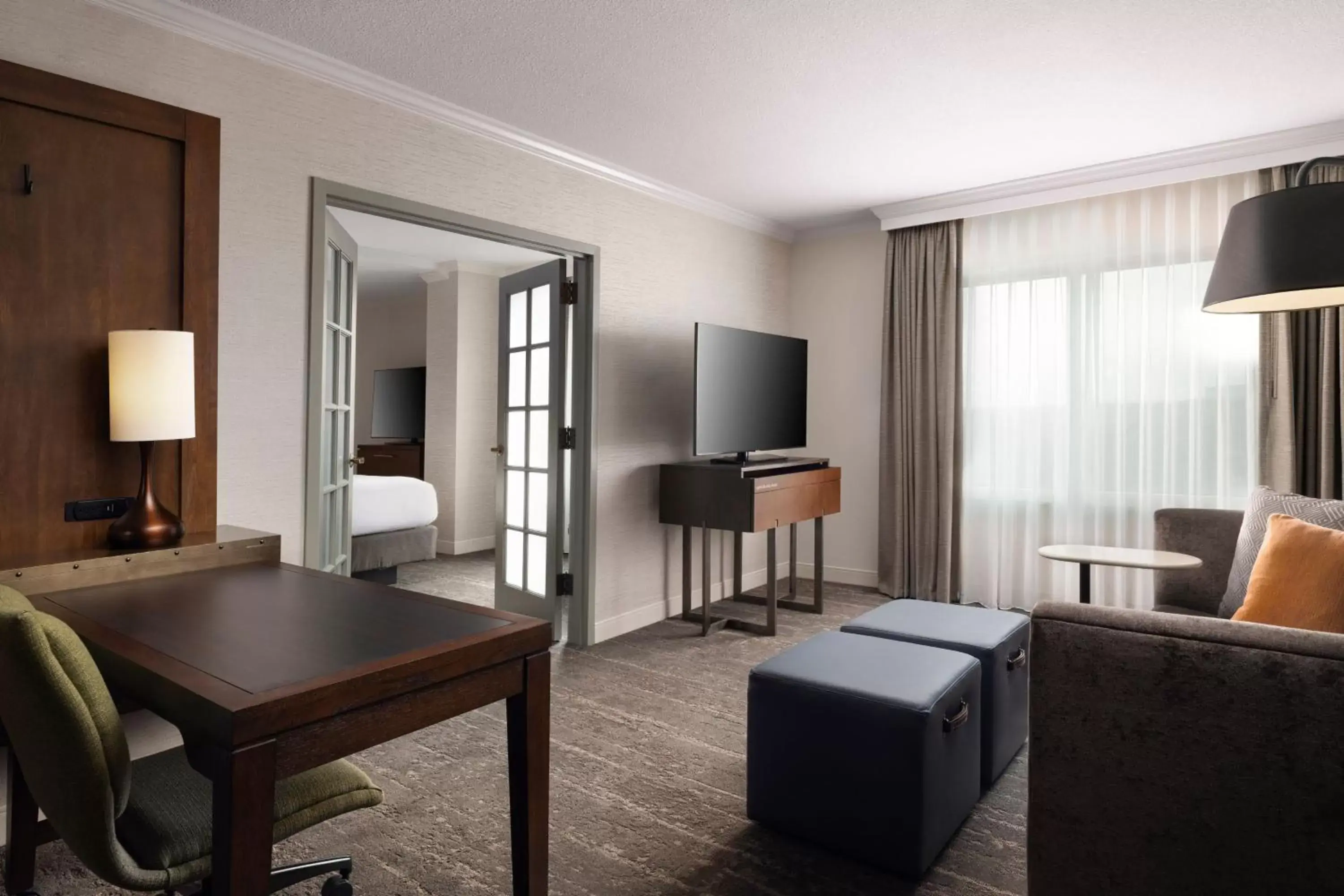 Bedroom, Seating Area in Renaissance Boulder Flatiron Hotel