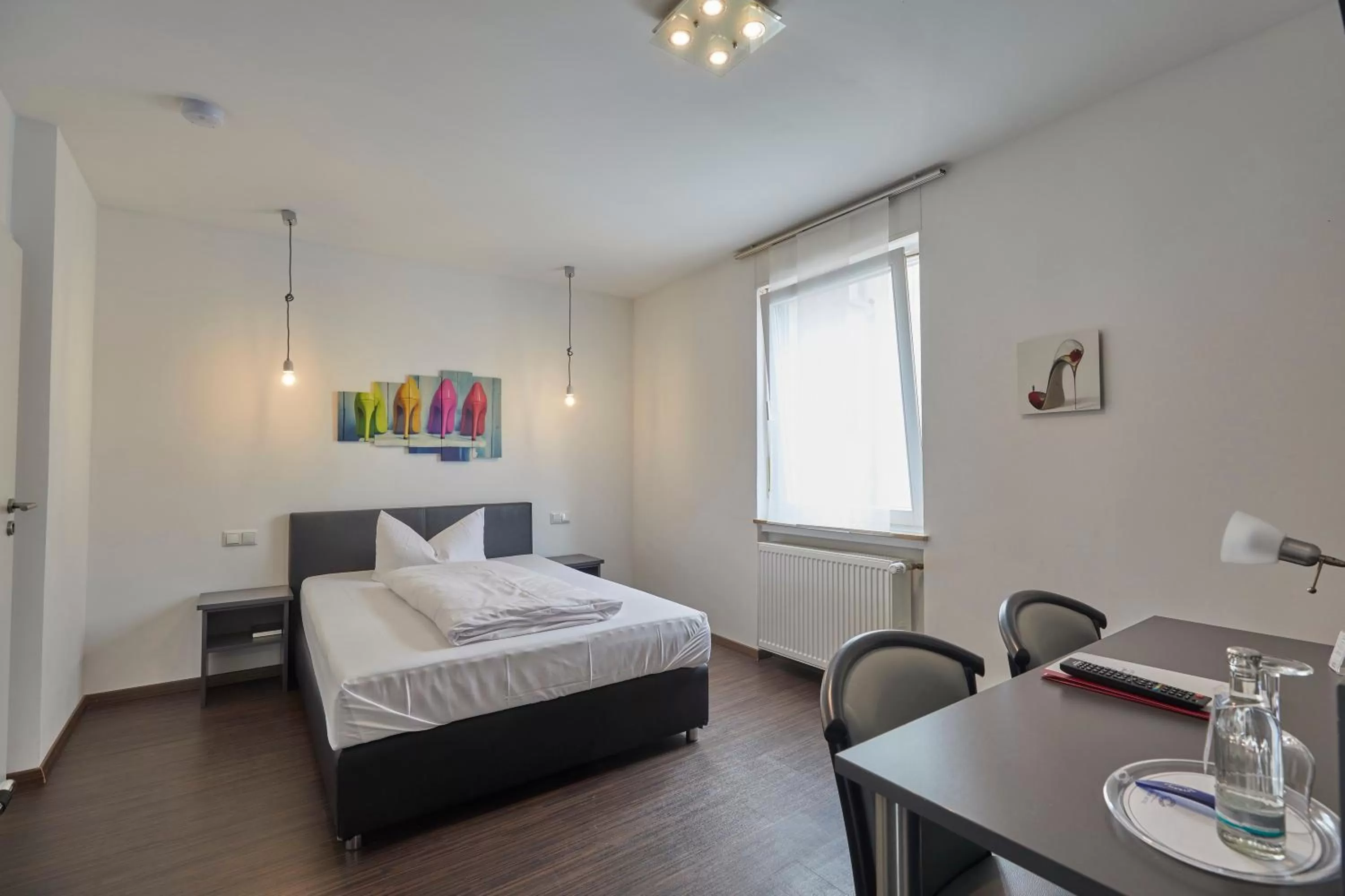 Photo of the whole room, Bed in Hotel Schlemmer Das familäre Altstadt - Hotel mit Herz