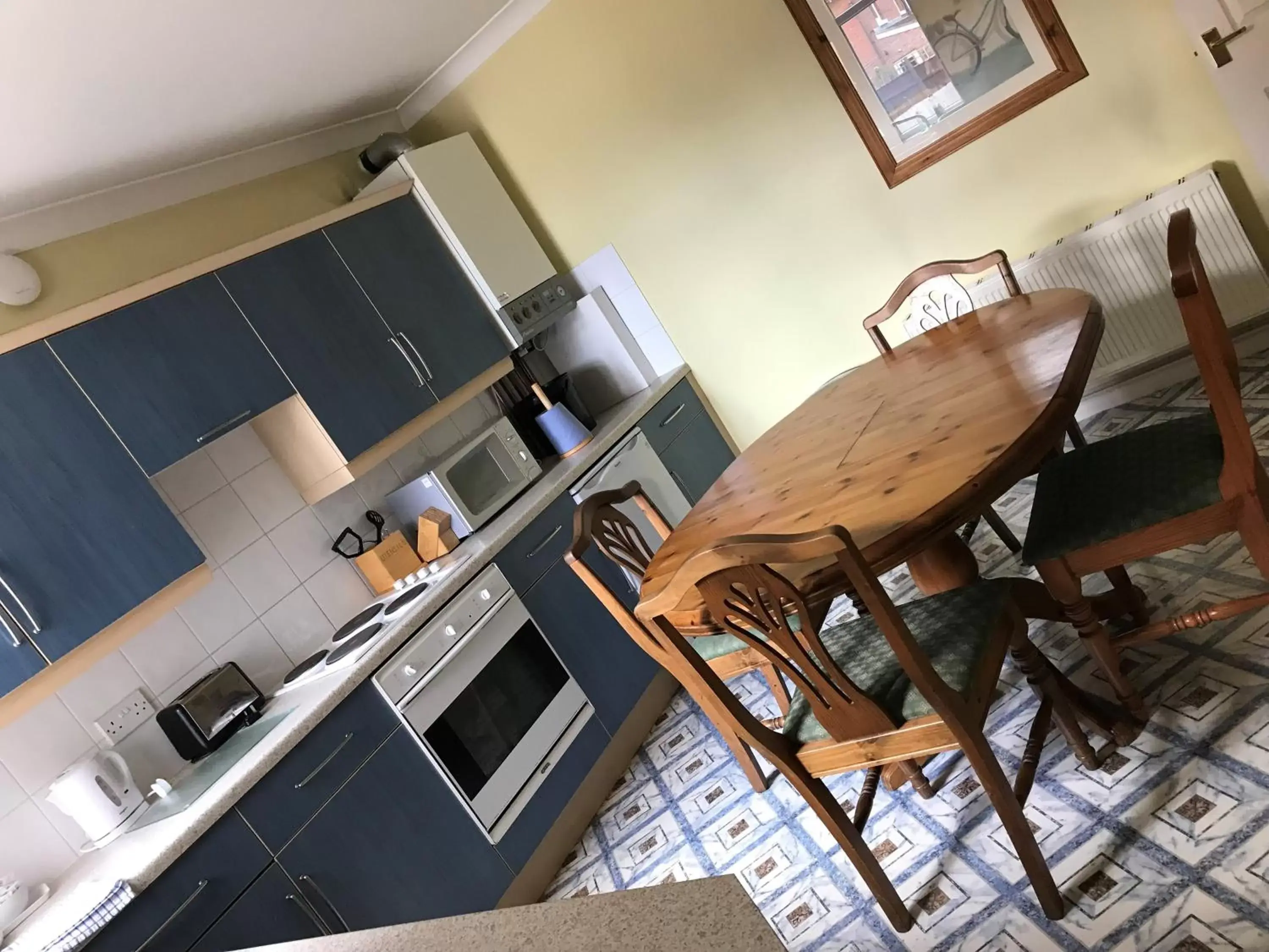 Kitchen/Kitchenette in Penny Farthing Hotel & Cottages