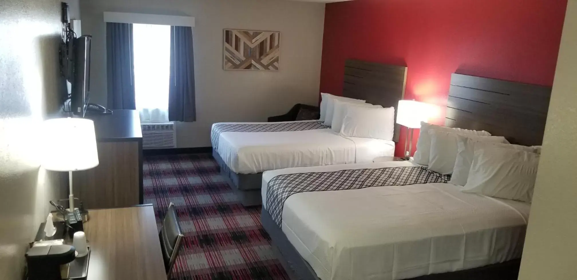Bed in SureStay Hotel by Best Western Higginsville