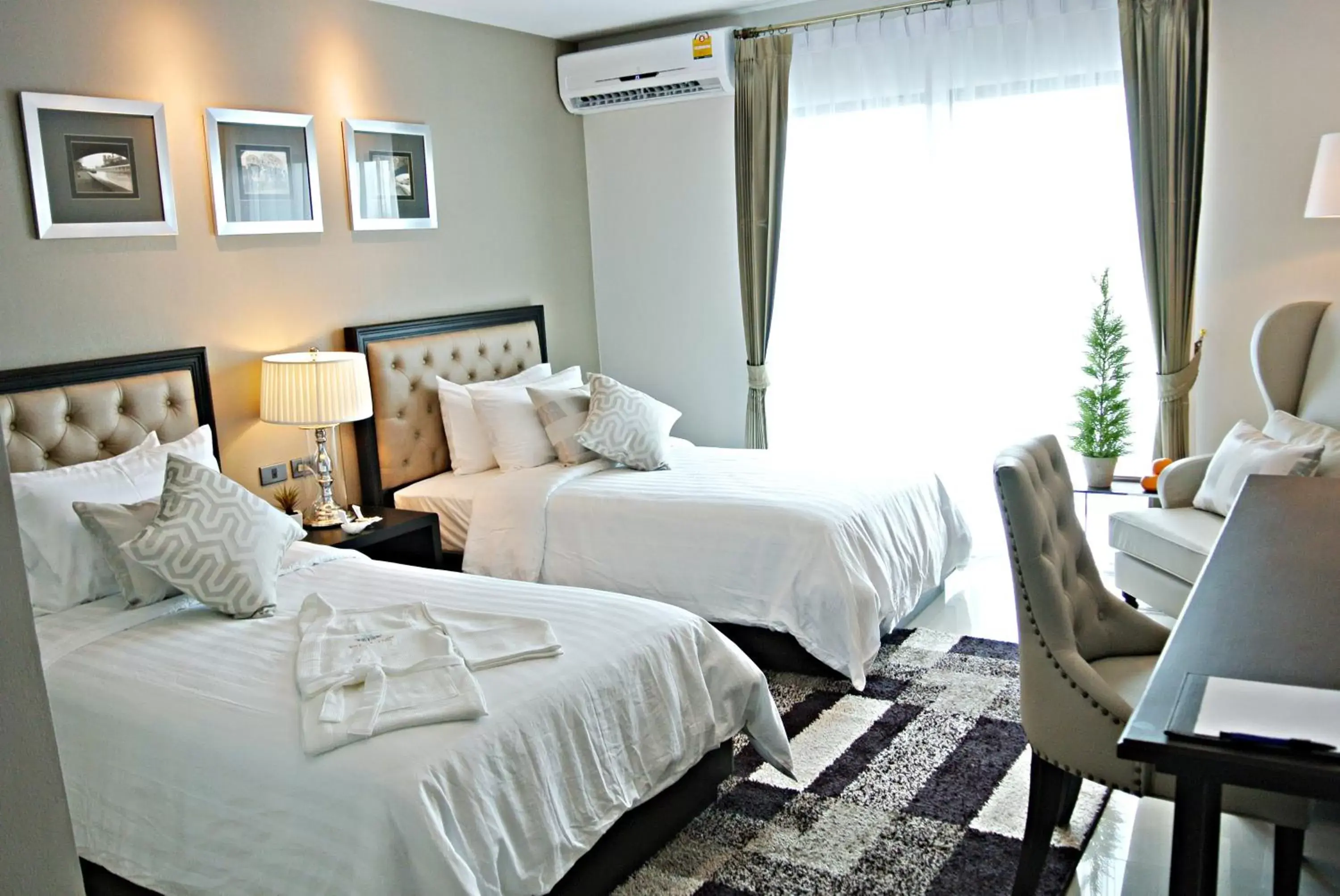 Photo of the whole room in SN Plus Hotel - SHA Plus Photo of the whole room in SN Plus Hotel - SHA Plus