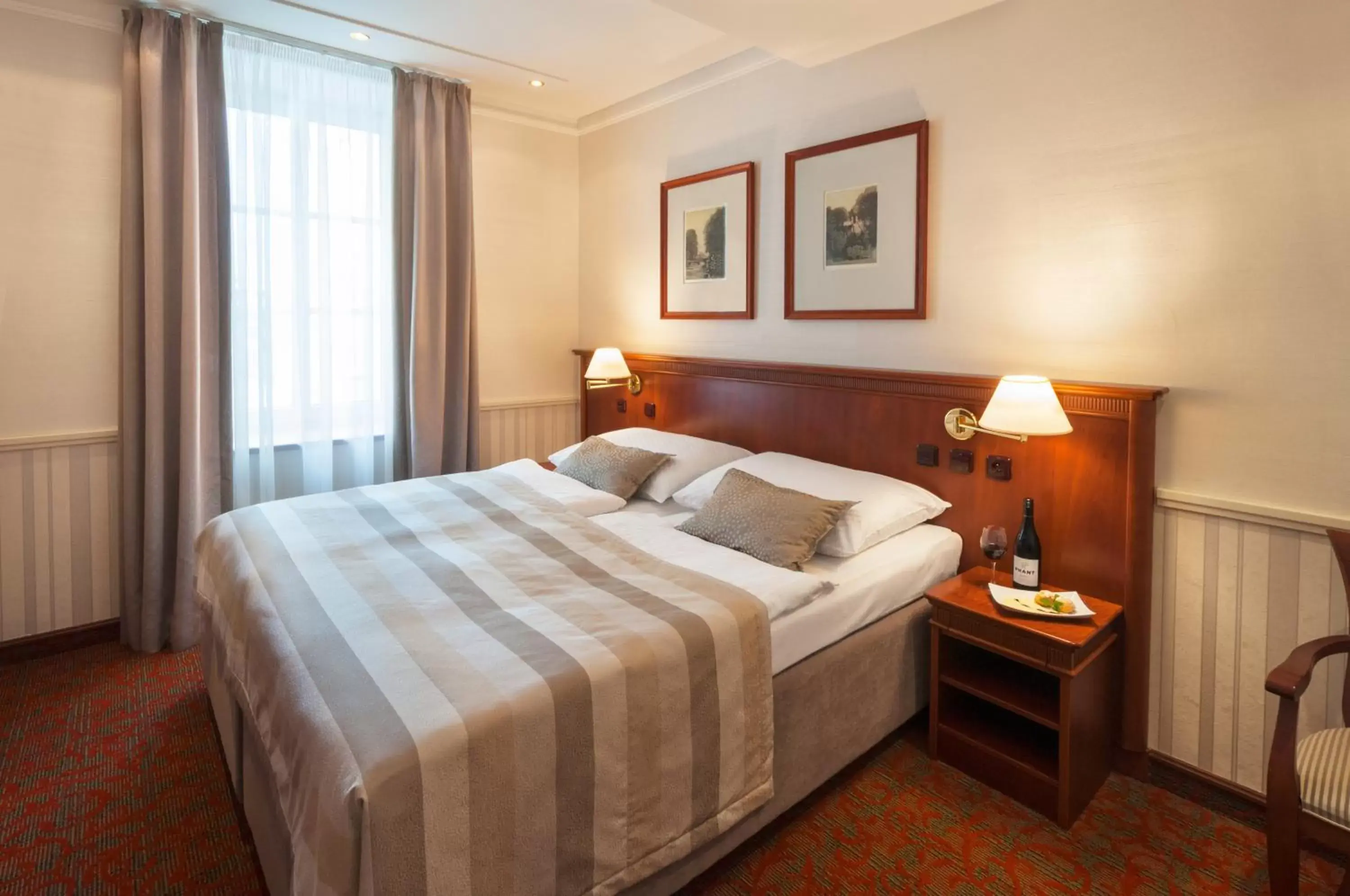 Bed in Adria Hotel Prague