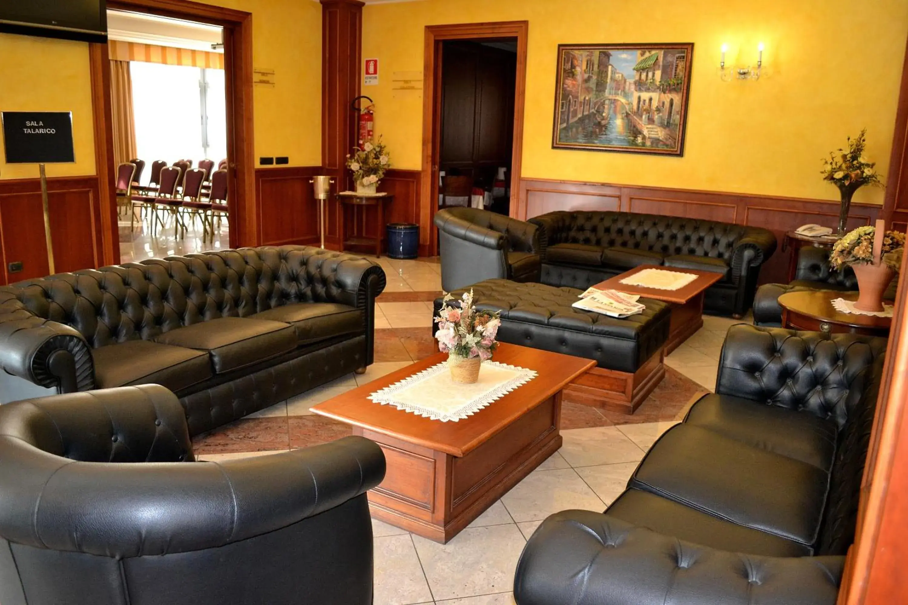 Communal lounge/ TV room, Seating Area in Tricolore Hotel
