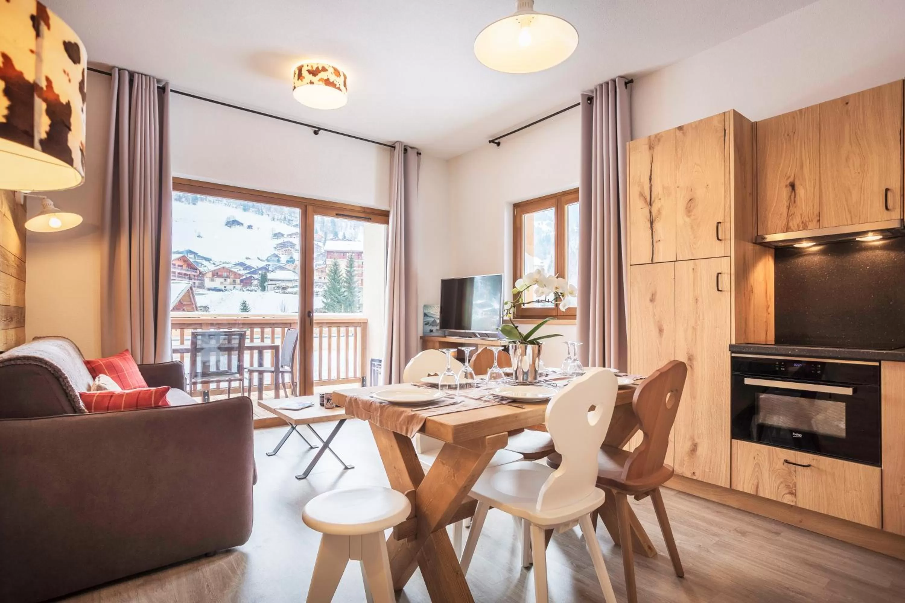 Kitchen or kitchenette in Résidence Club MMV La Clé des Cimes