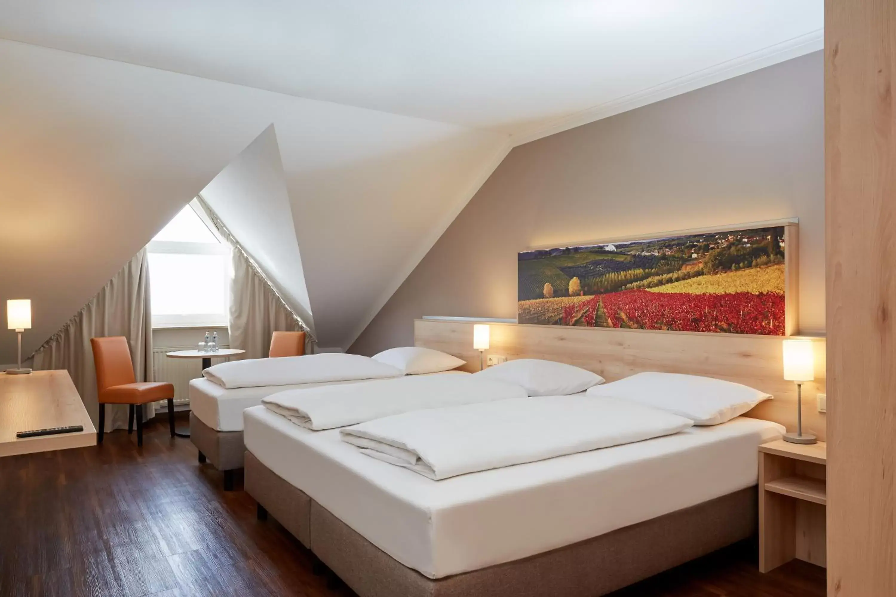 Photo of the whole room, Bed in H+ Hotel Stuttgart Herrenberg