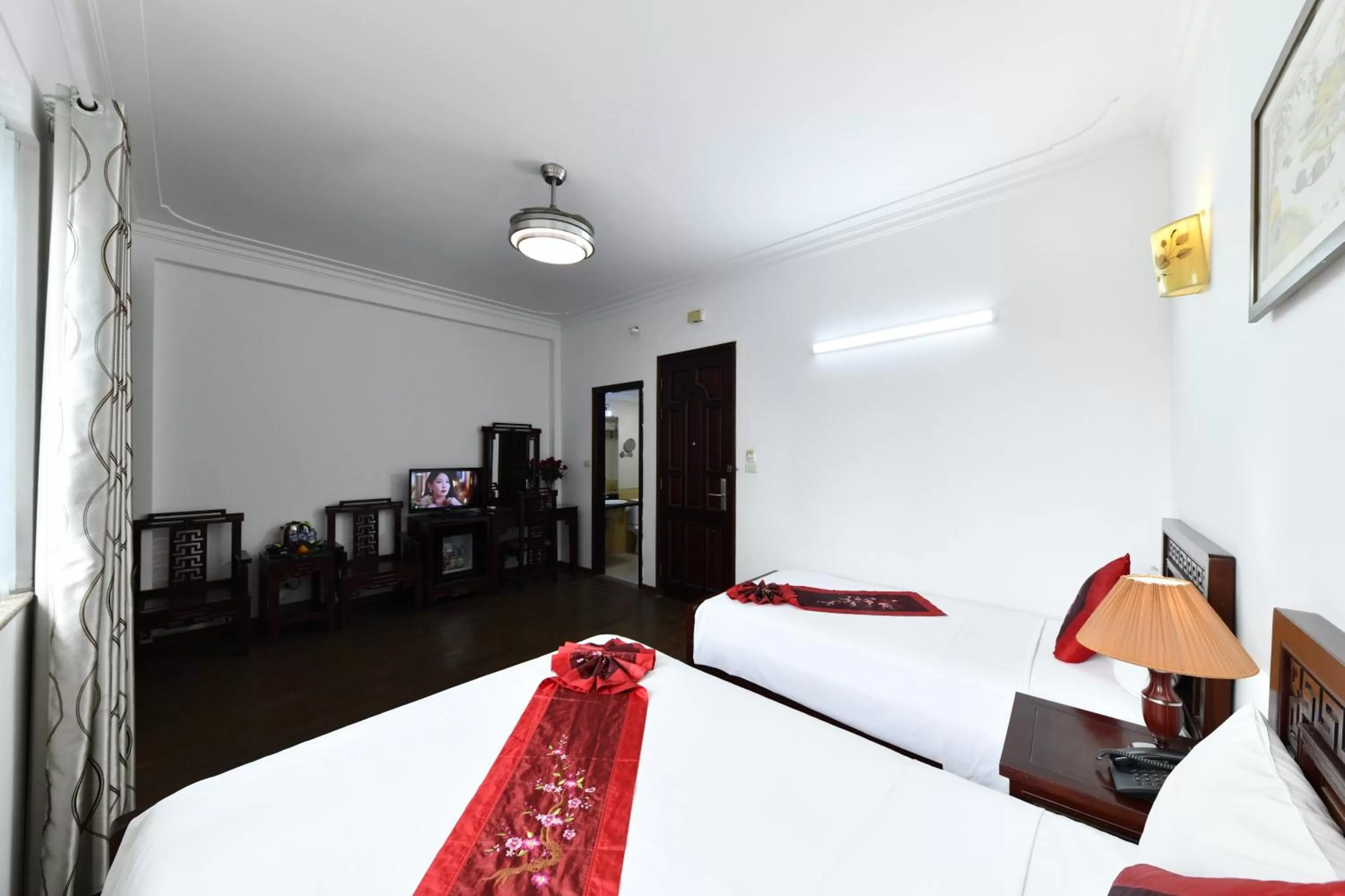 Bed in Phoenix Legend Hotel Hanoi