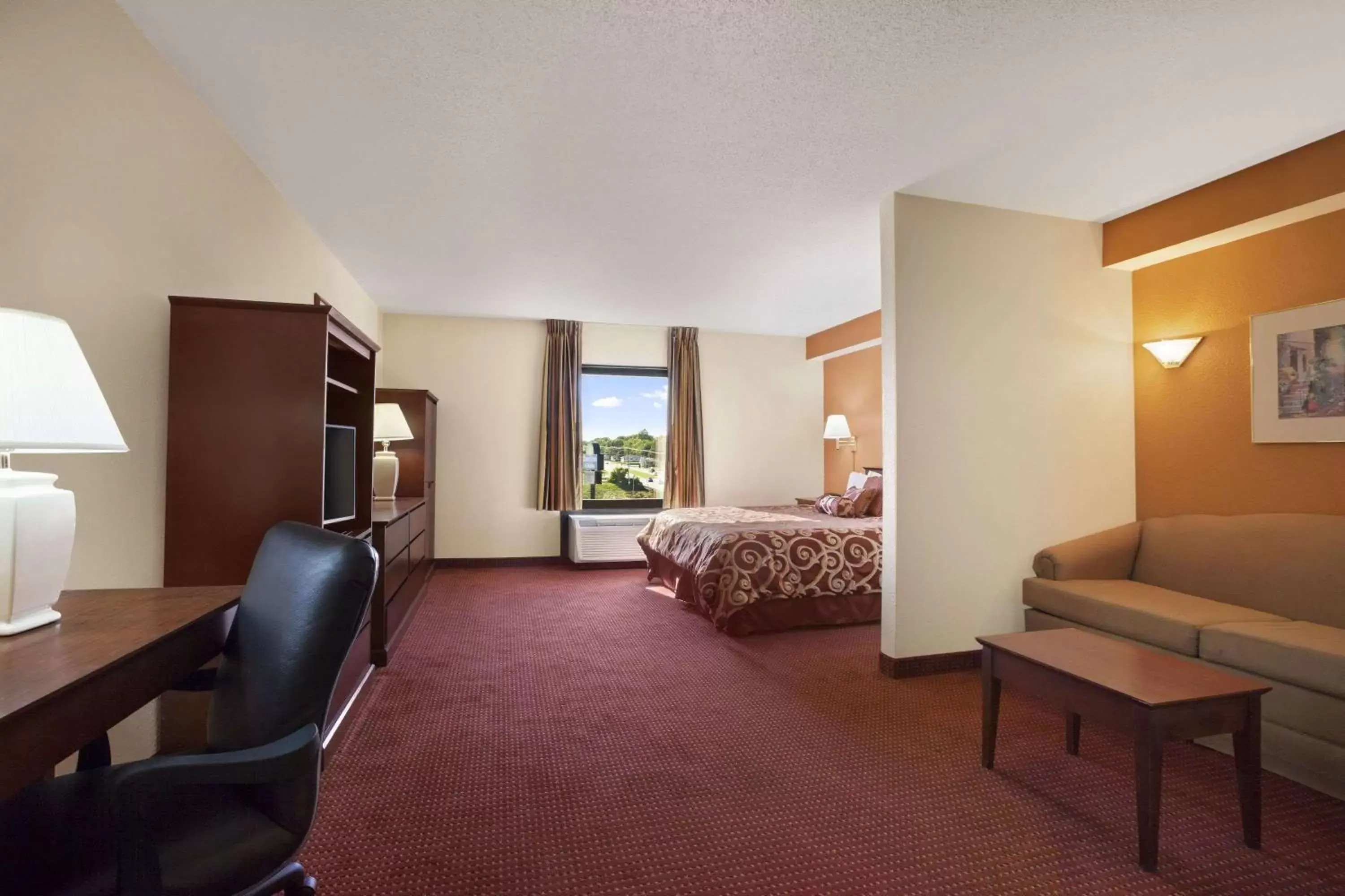 Photo of the whole room, Seating Area in Days Inn & Suites by Wyndham Cedar Rapids