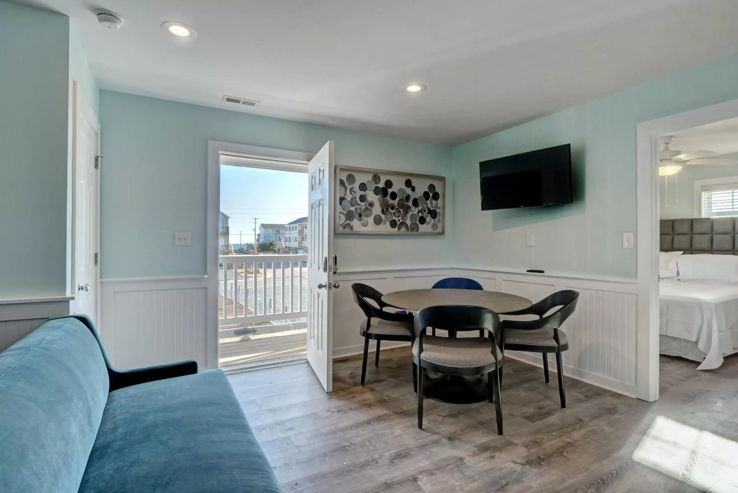 Property building, Seating Area in Loggerhead Inn and Suites by Carolina Retreats