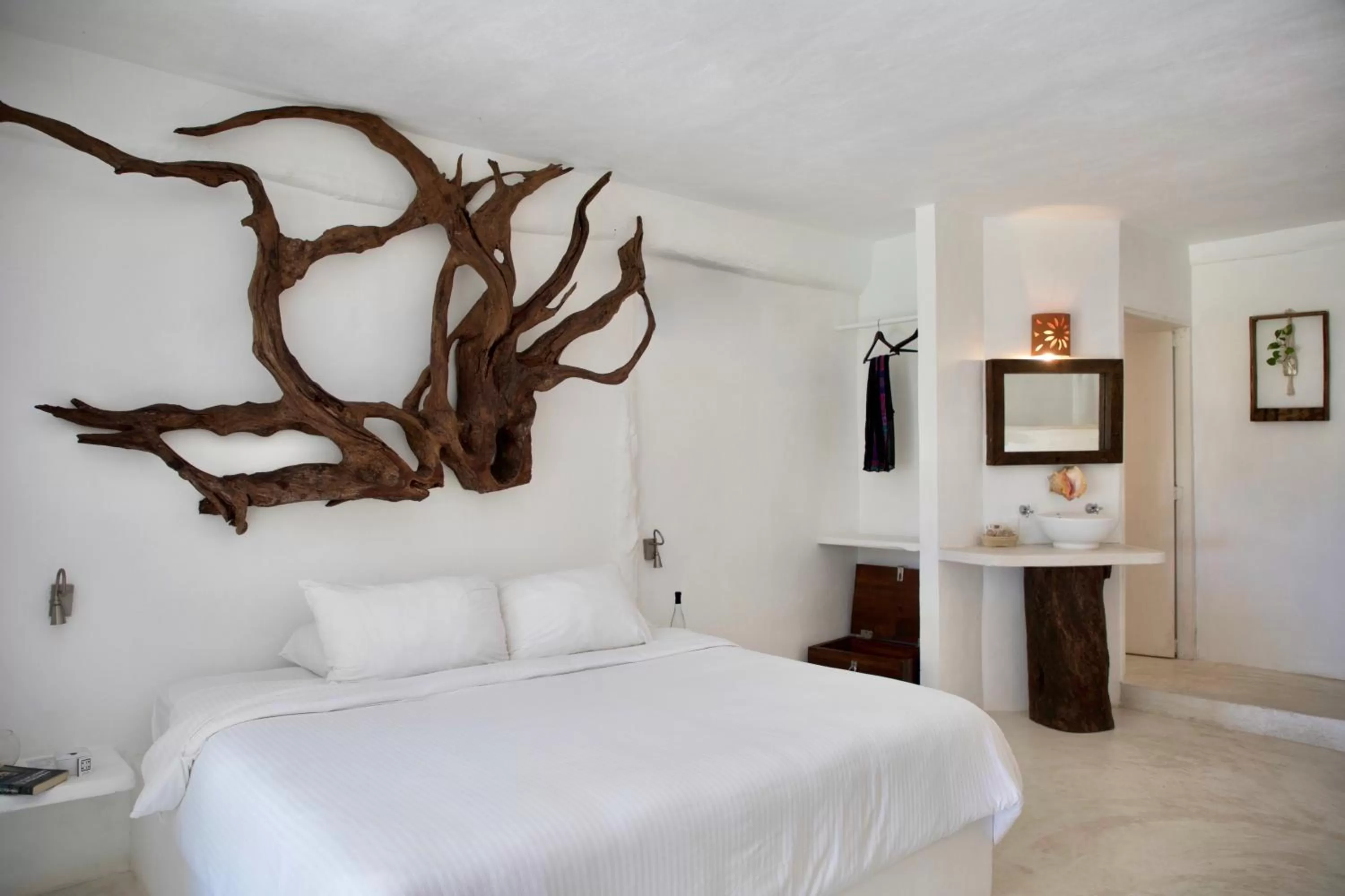 Bed in Coco Tulum Beach Club Hotel