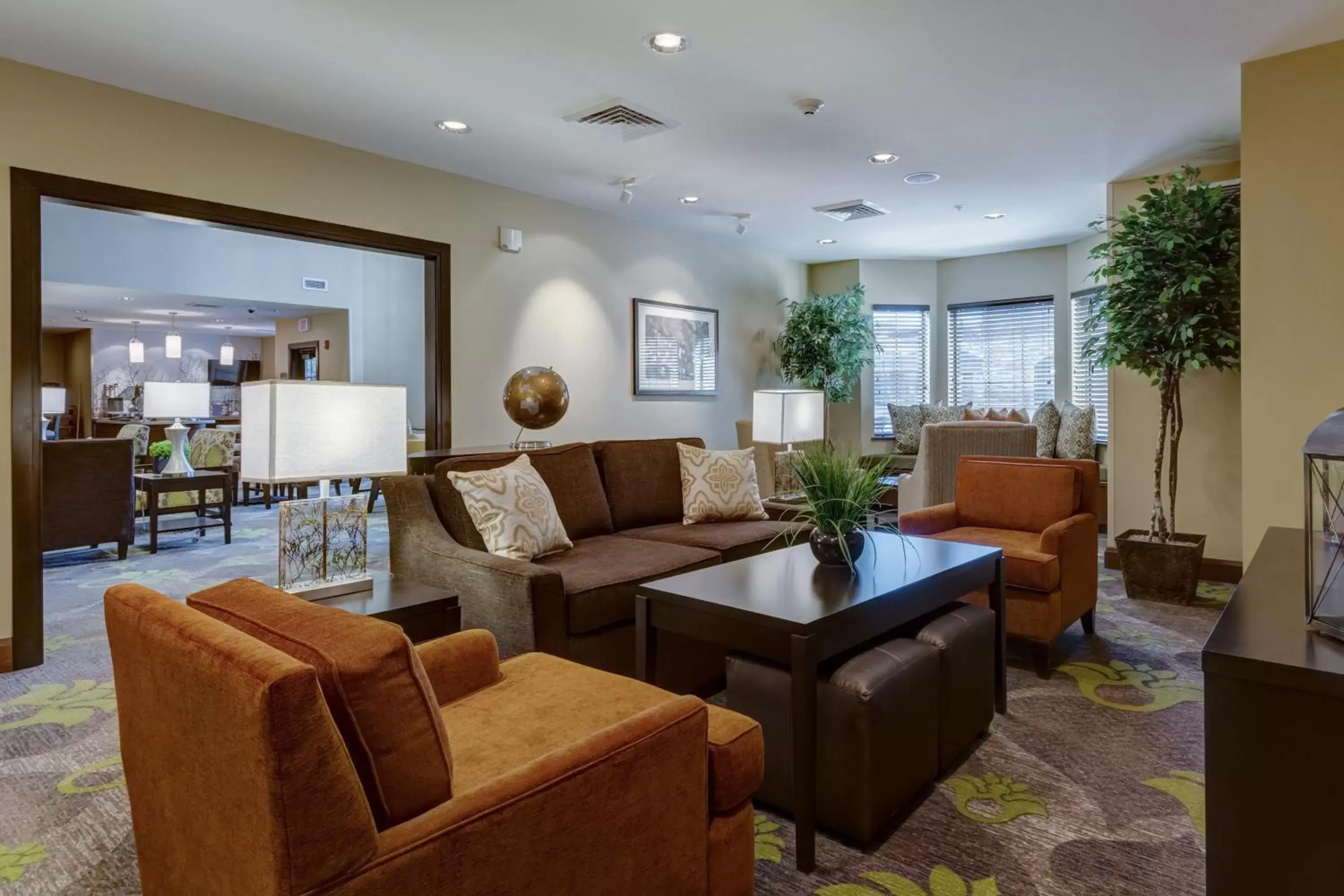 Lobby or reception, Seating Area in Staybridge Suites St Louis - Westport, an IHG hotel