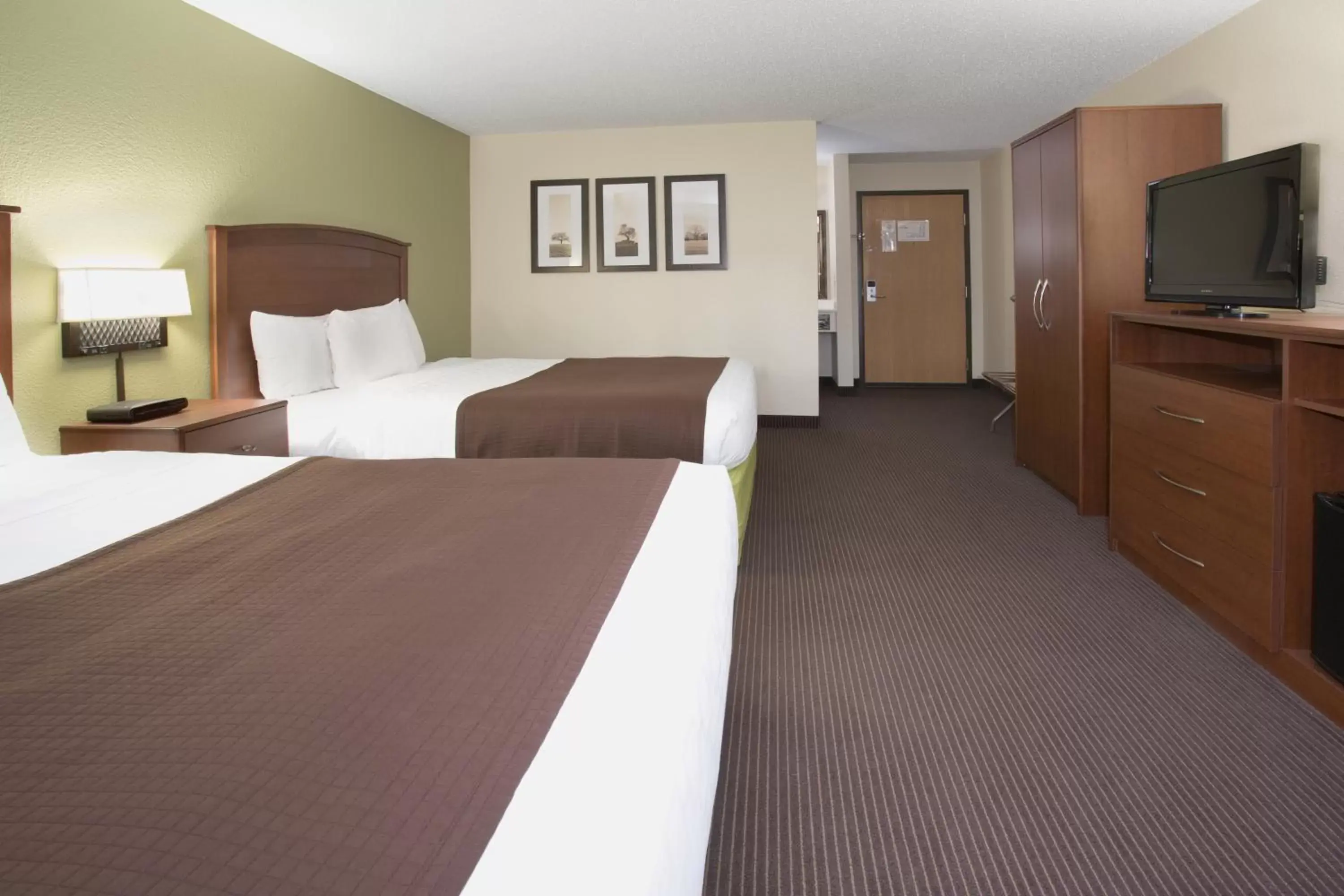 Bedroom, Bed in Cobblestone Hotel & Suites - Wisconsin Rapids