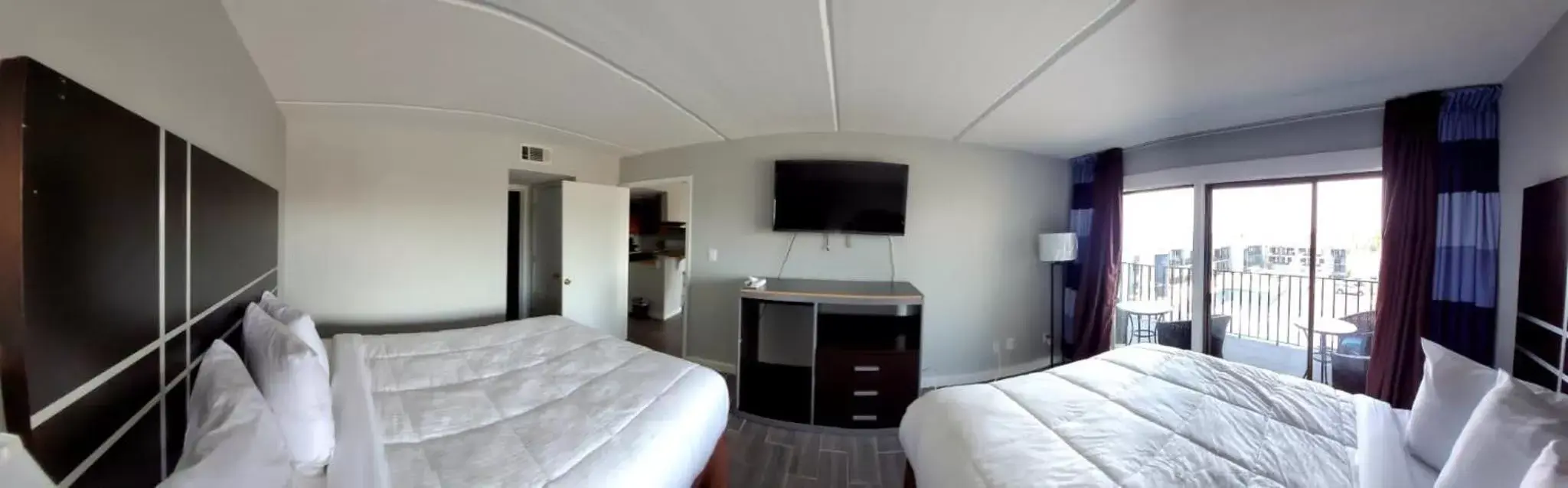 Living room, TV/Entertainment Center in South Padre Island Lodge