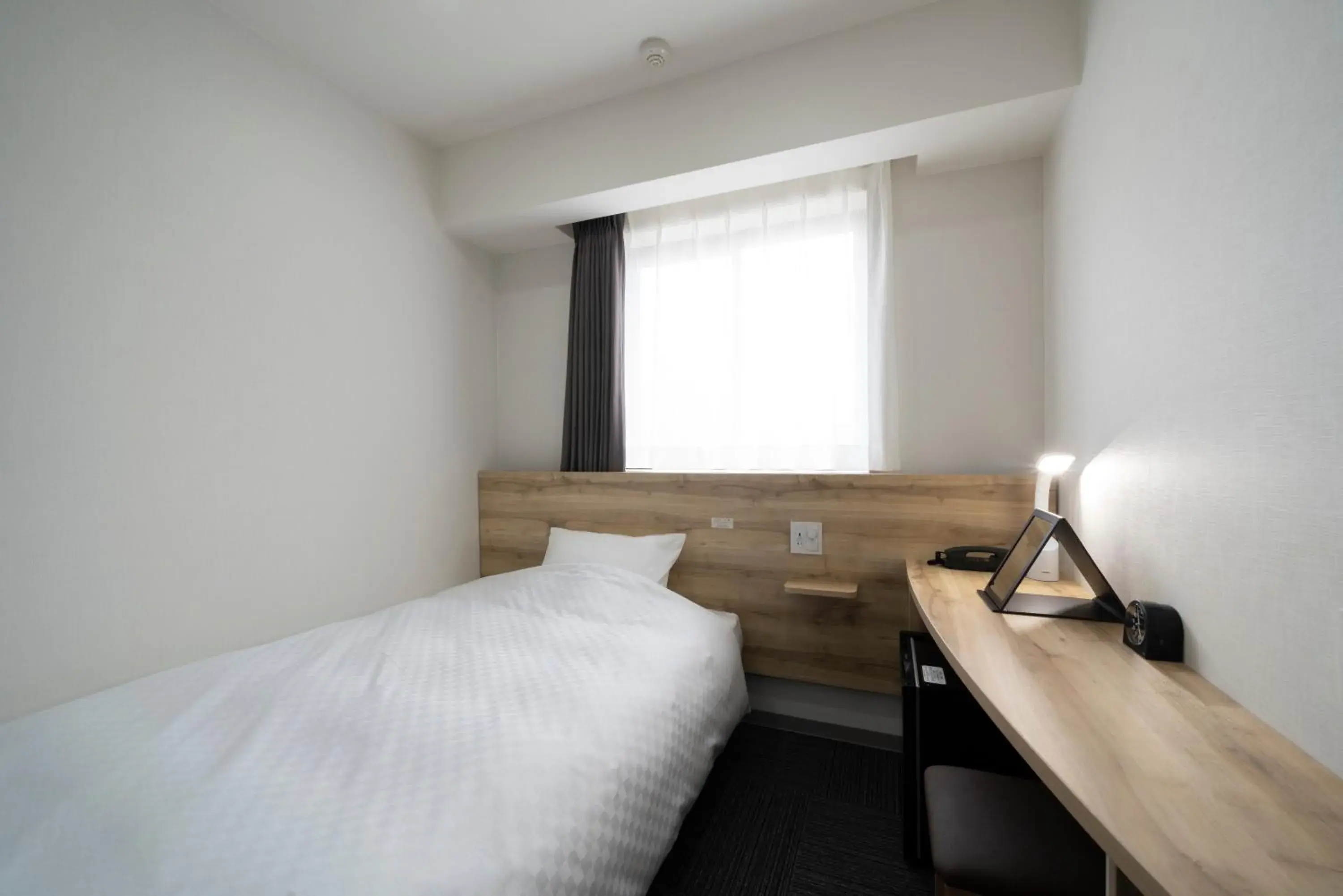 Bed in Washington R&B Hotel Nagoya Shinkansenguchi Bed in Washington R&B Hotel Nagoya Shinkansenguchi