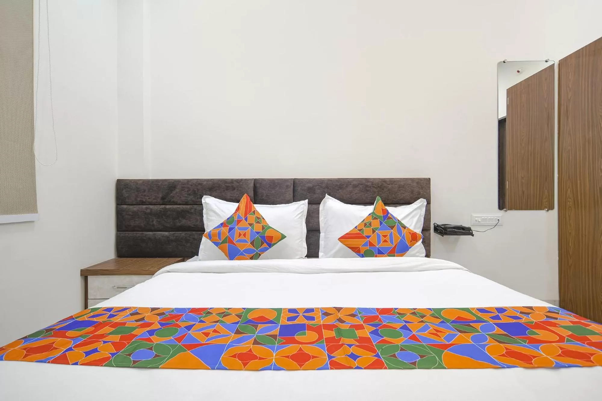 Bed in FabHotel Ramya