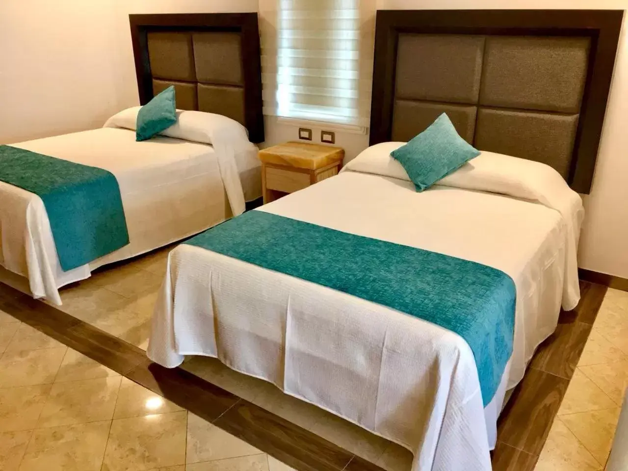 Bed in Hotel Blue Star Cancun