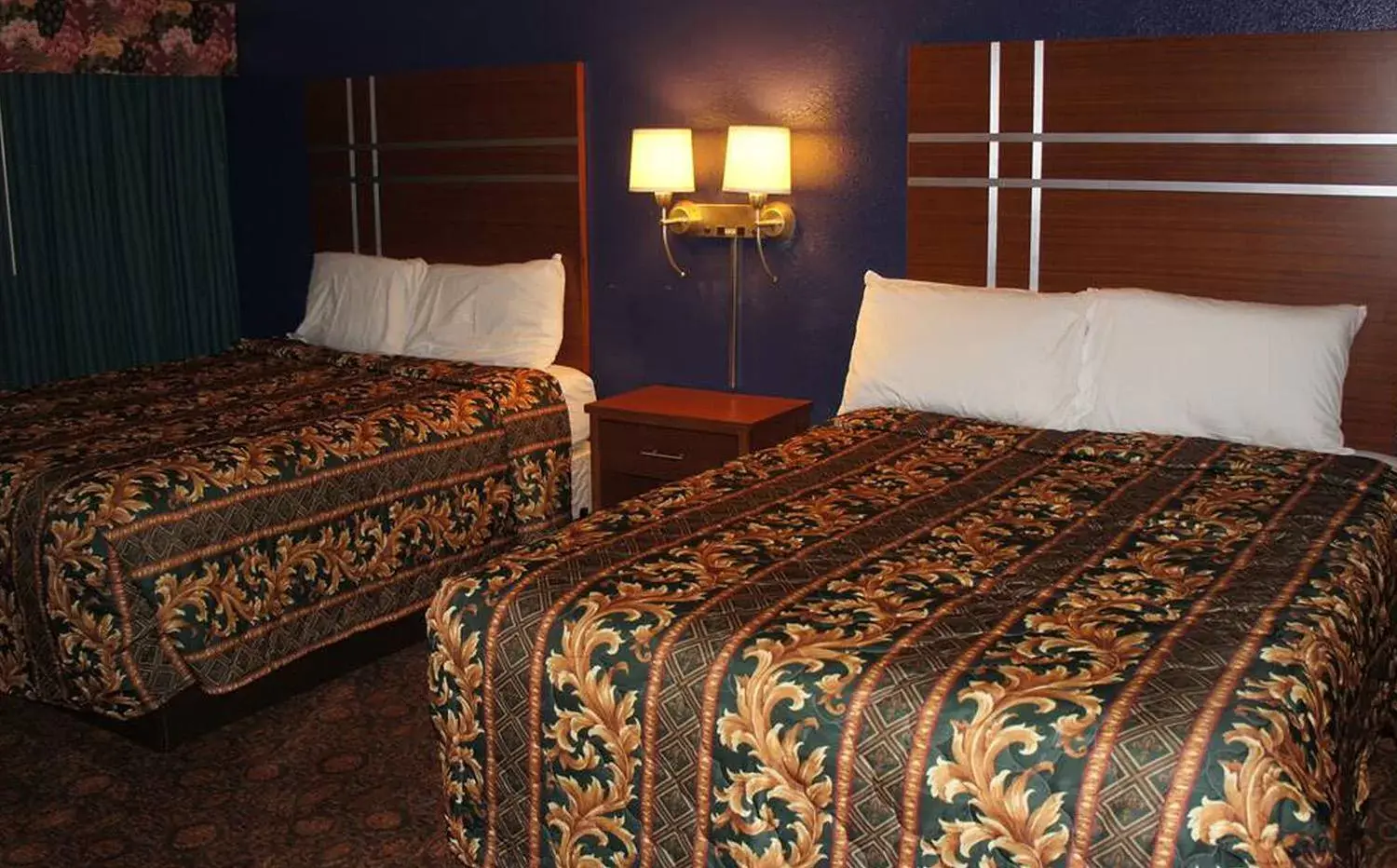 Bed in Coratel Inn & Suites by Jasper Waite Park