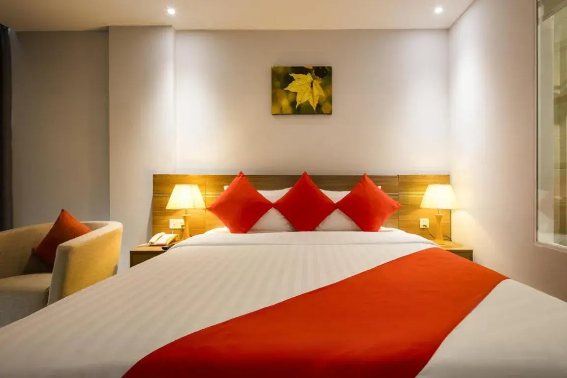 Bed in Maple Leaf Hotel & Apartment