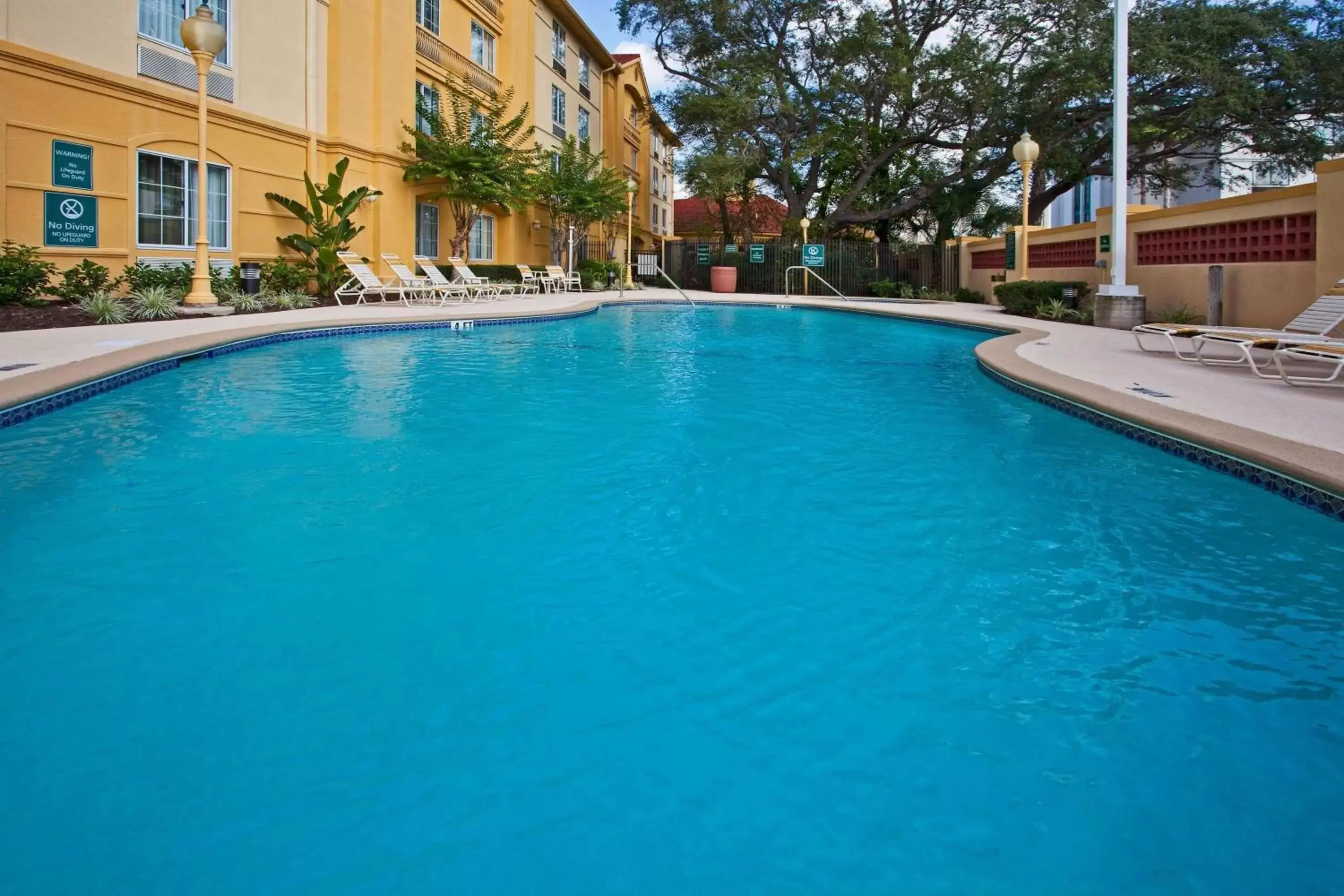 On site, Swimming Pool in La Quinta by Wyndham USF (Near Busch Gardens)