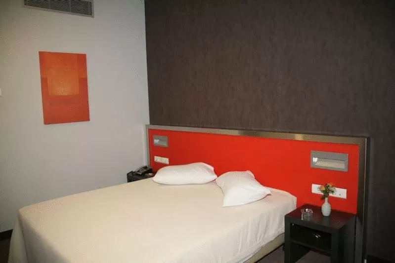 Bed in Hotel Des Roses