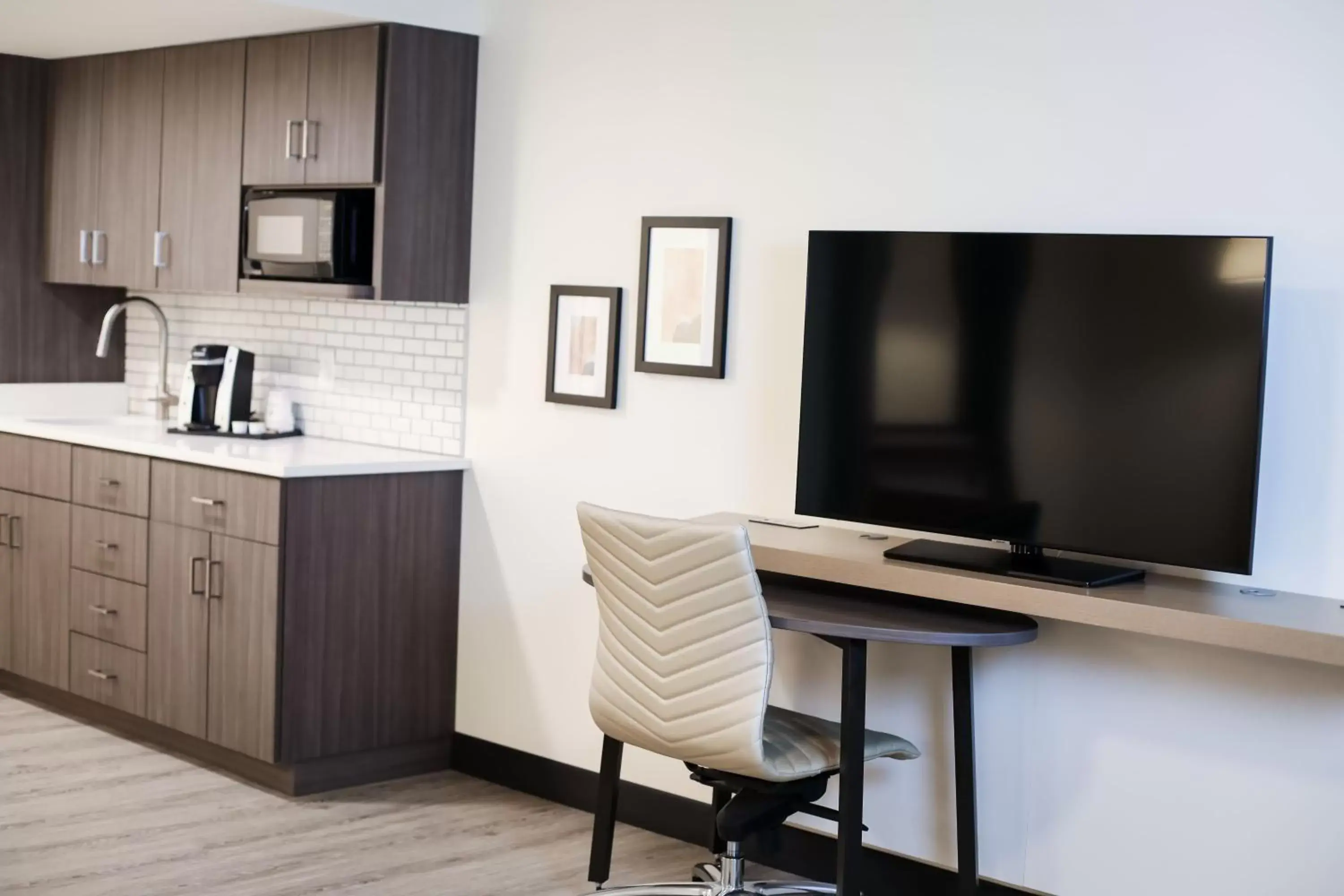 Photo of the whole room, TV/Entertainment Center in Holiday Inn & Suites St. Cloud, an IHG Hotel