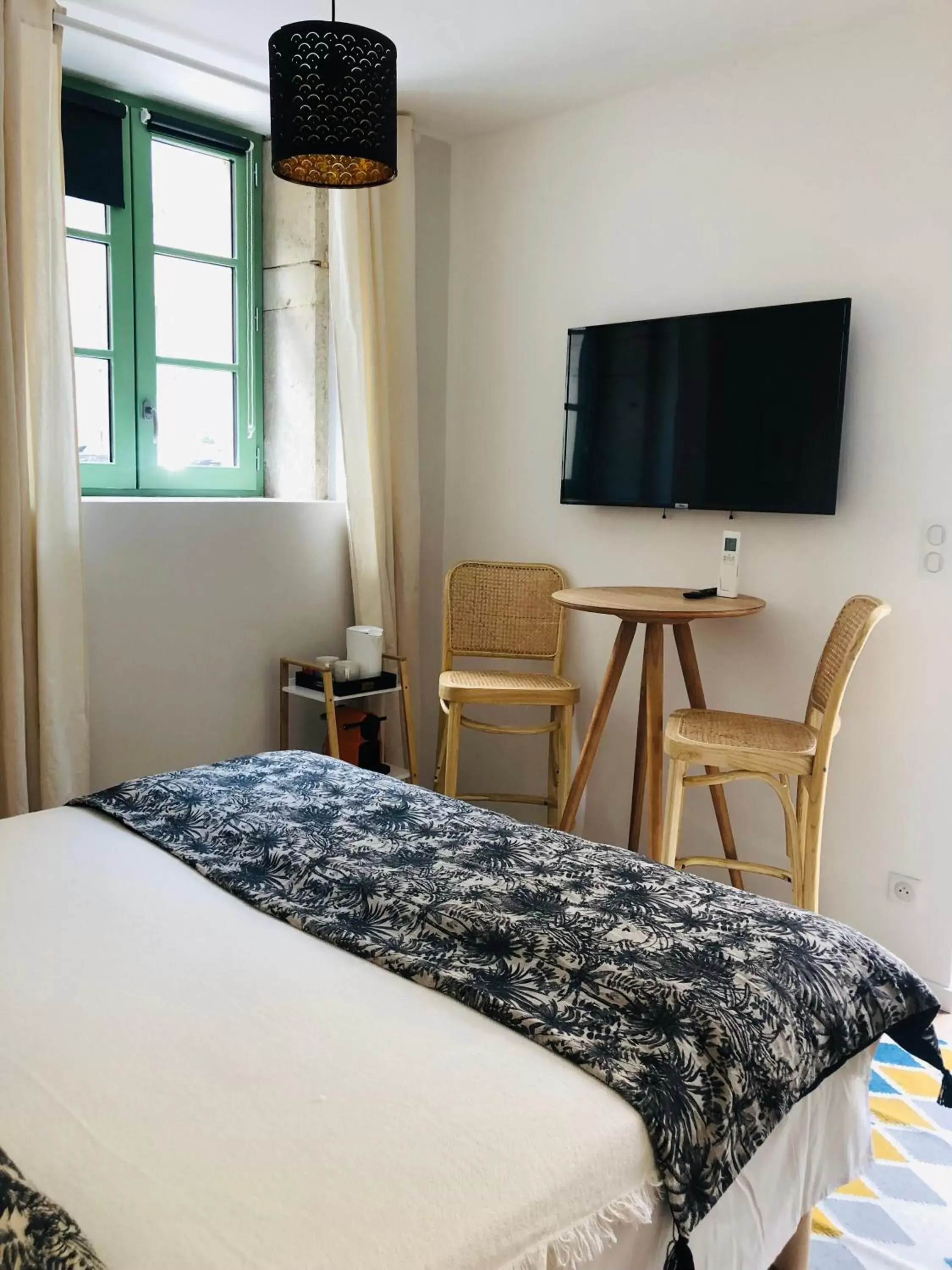 Seating area, TV/Entertainment Center in Maison Tassigny