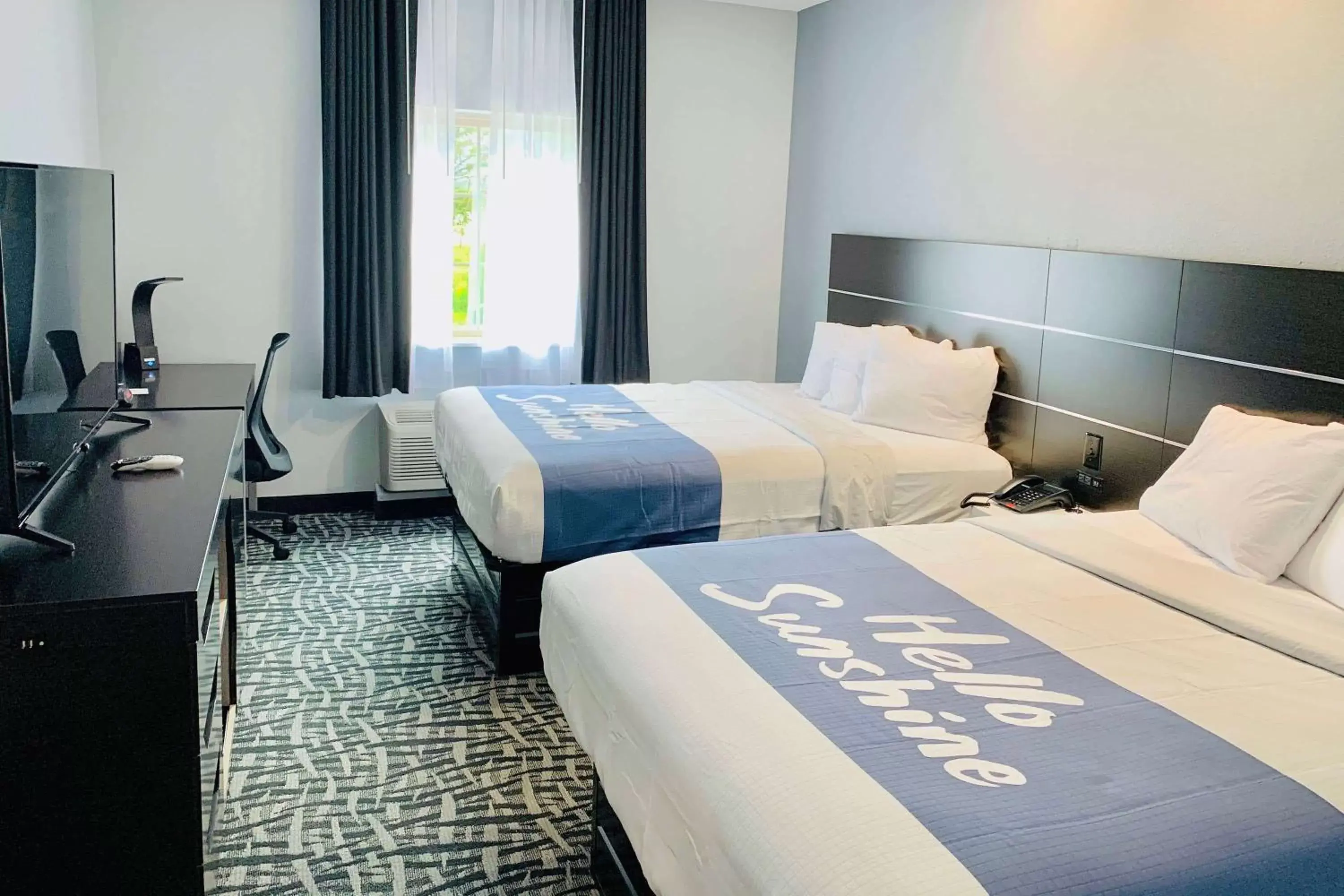 Photo of the whole room, Bed in Days Inn & Suites by Wyndham Horn Lake - Memphis Graceland Photo of the whole room, Bed in Days Inn & Suites by Wyndham Horn Lake - Memphis Graceland